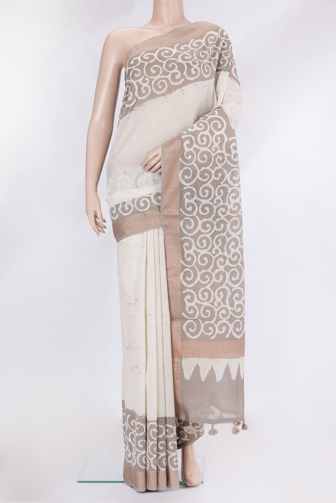 Beige Dual Tone Chanderi Silk Saree with Stripes on the body and Thread Border.  displayed on a mannequin
