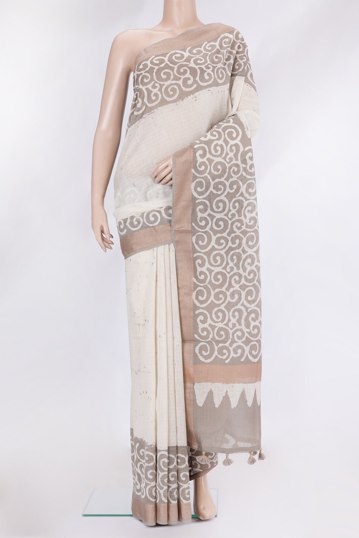 Beige Dual Tone Chanderi Silk Saree with Stripes on the body and Thread Border.  displayed on a mannequin