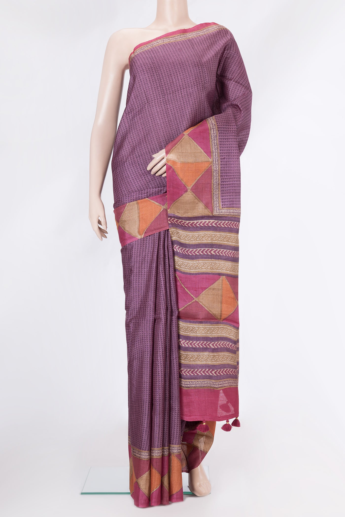 Purple Dual Tone Tussar Silk Saree with Printed design on the body and Fancy Border.  displayed on a mannequin