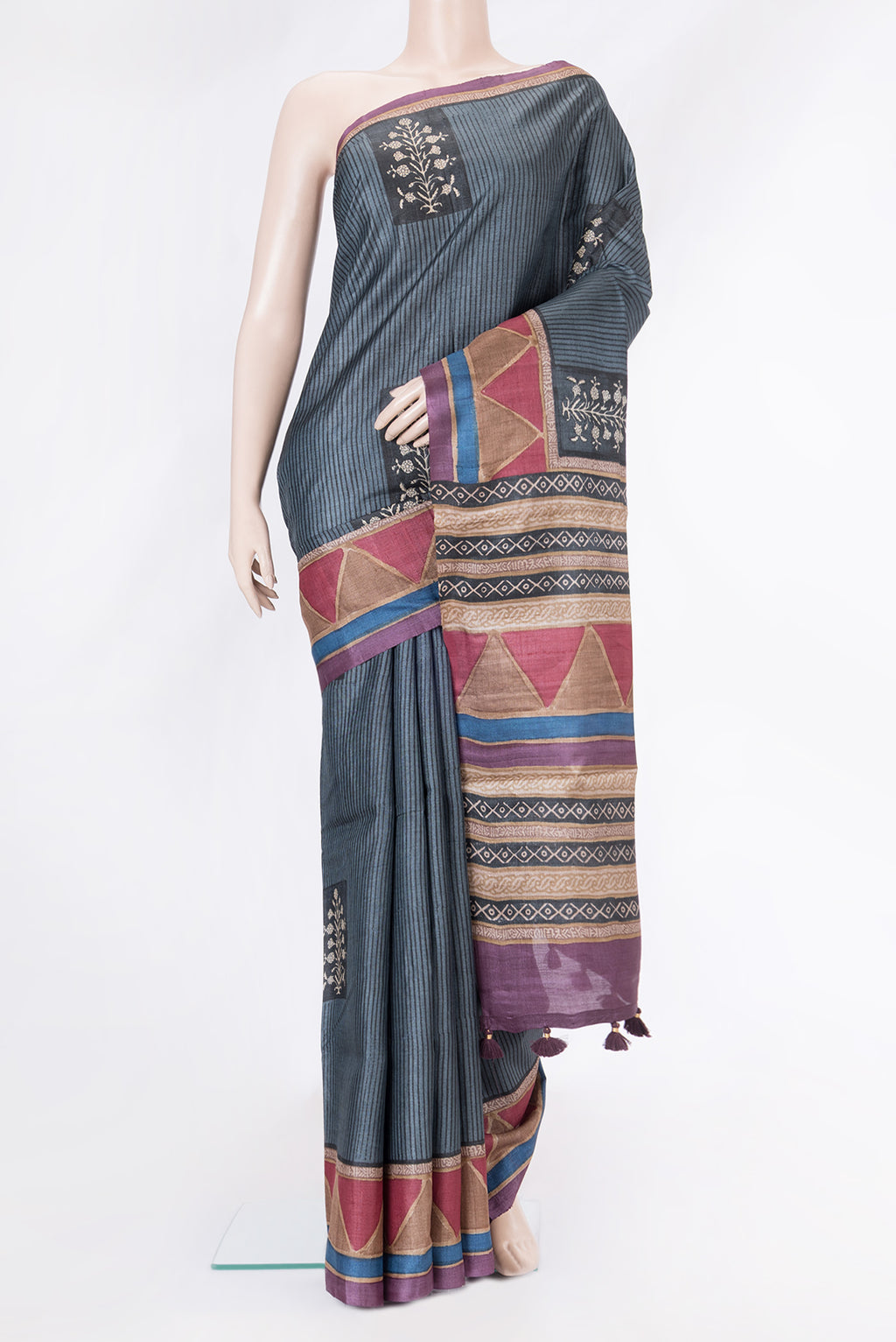 Grey Dual Tone Tussar Silk Saree with Printed design on the body and Printed Border.  displayed on a mannequin