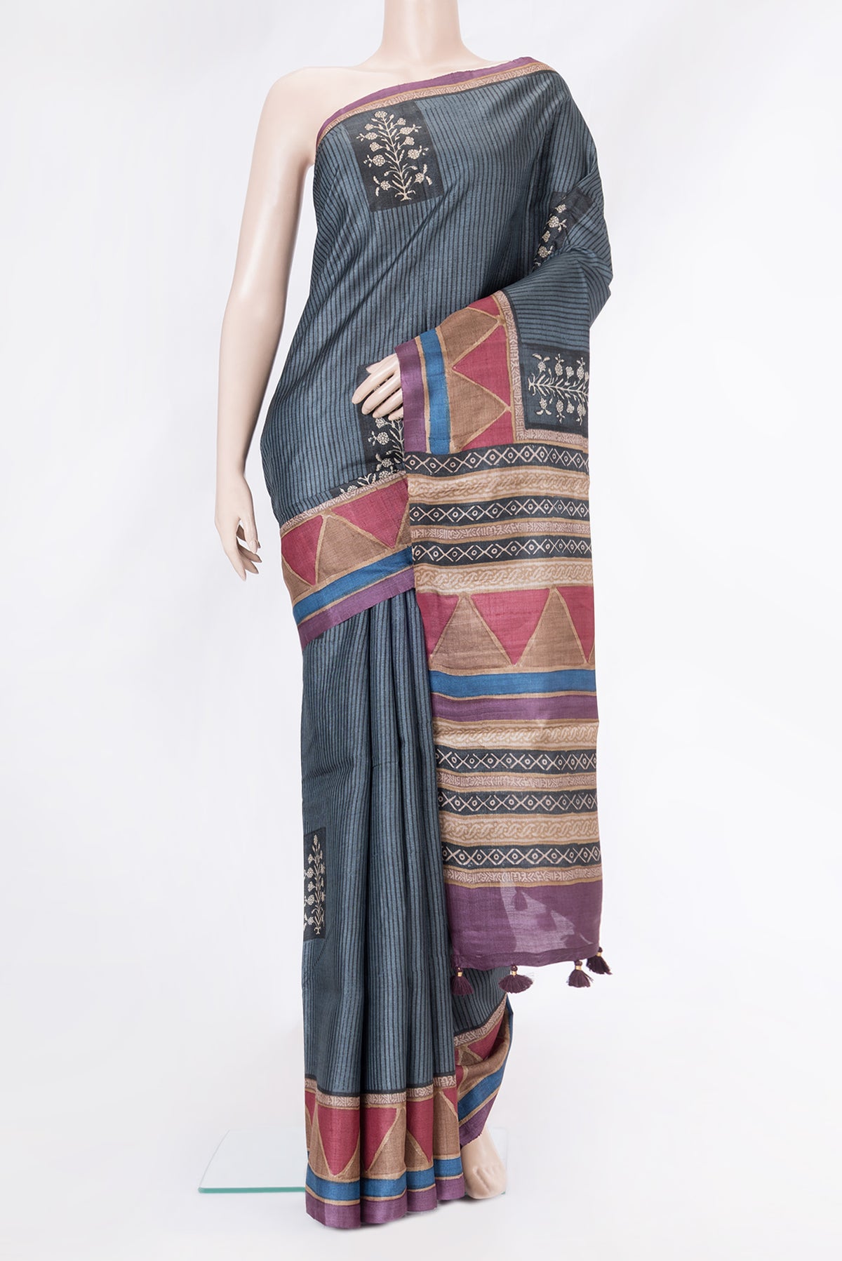Grey Dual Tone Tussar Silk Saree with Printed design on the body and Printed Border.  displayed on a mannequin