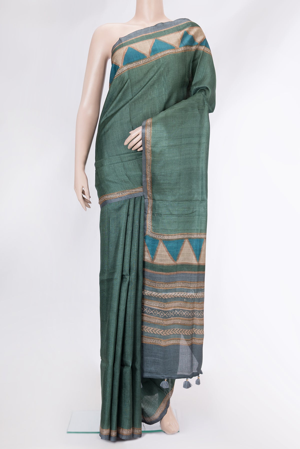 Green Dual Tone Tussar Silk Saree with Plain Body and Fancy Border.  displayed on a mannequin