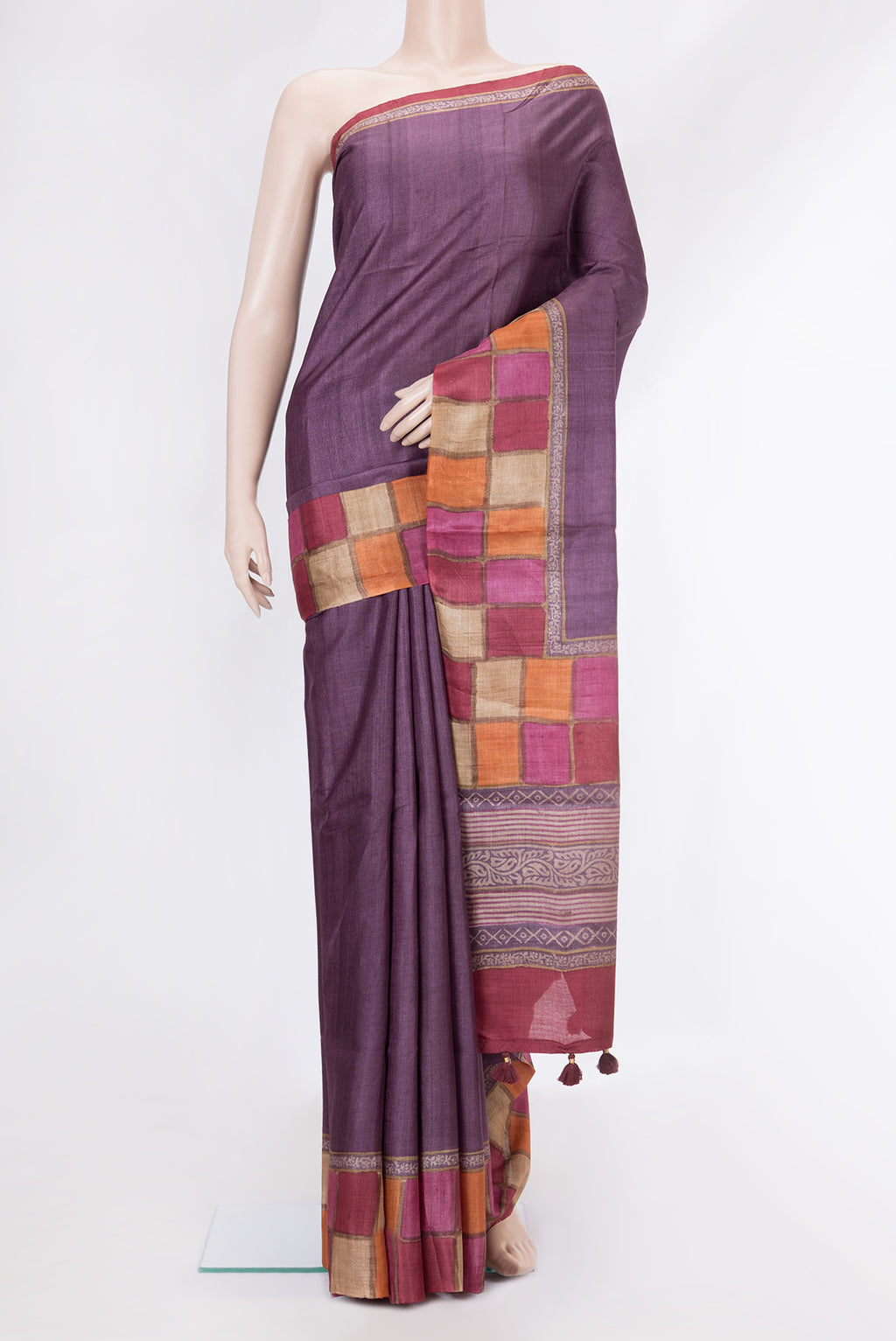 Purple Dual Tone Tussar Silk Saree with Plain Body and Fancy Border.  displayed on a mannequin