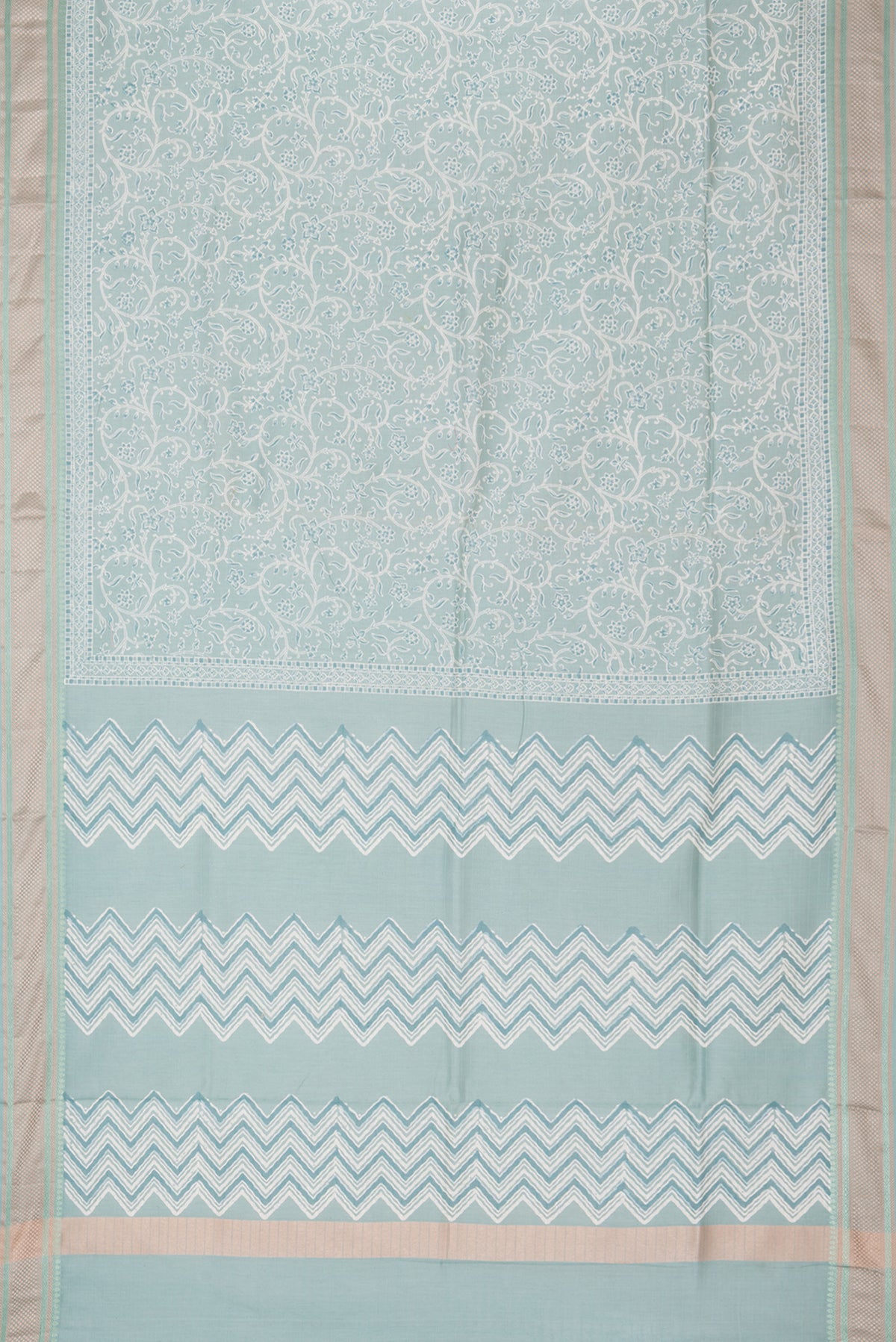 Flat view of Pure Silk Light Blue Dual Tone Chanderi Saree with Printed design on the body and Thread Border. 