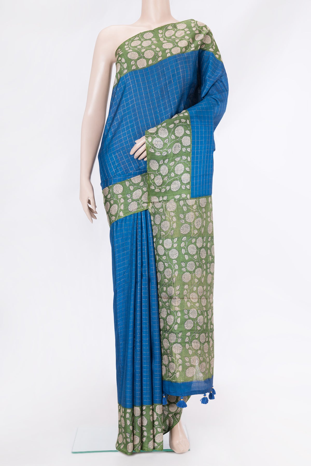 Royal Blue Dual Tone Tussar Silk Saree with Checked design on the body and Printed Border.  displayed on a mannequin