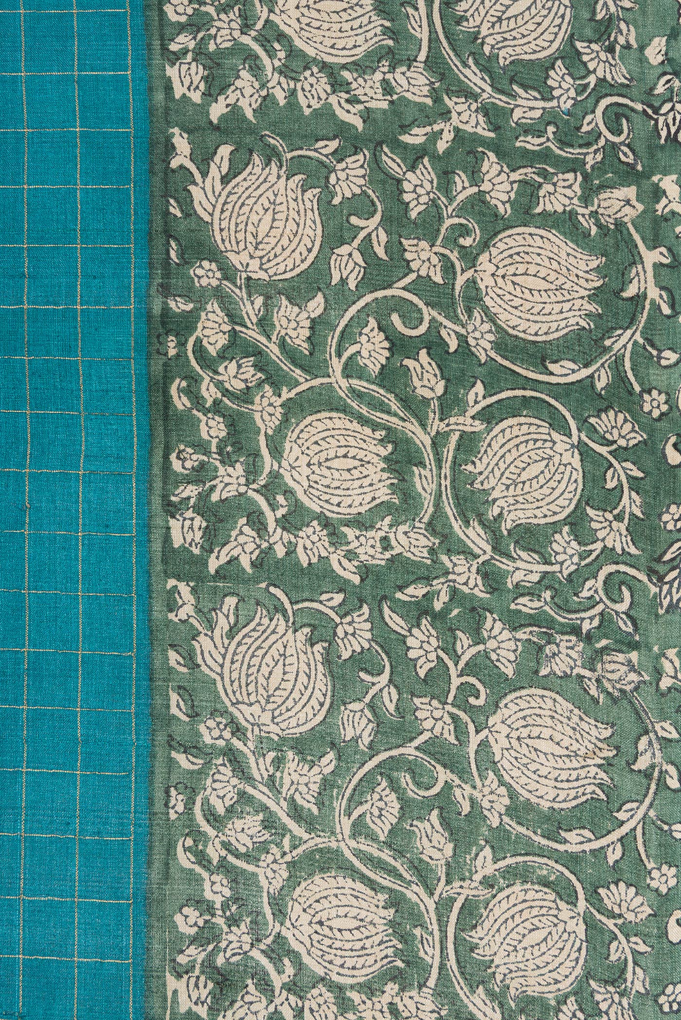 Border image of Peacock Blue Dual Tone Tussar Silk Saree with Checked design on the body and Printed Border. 