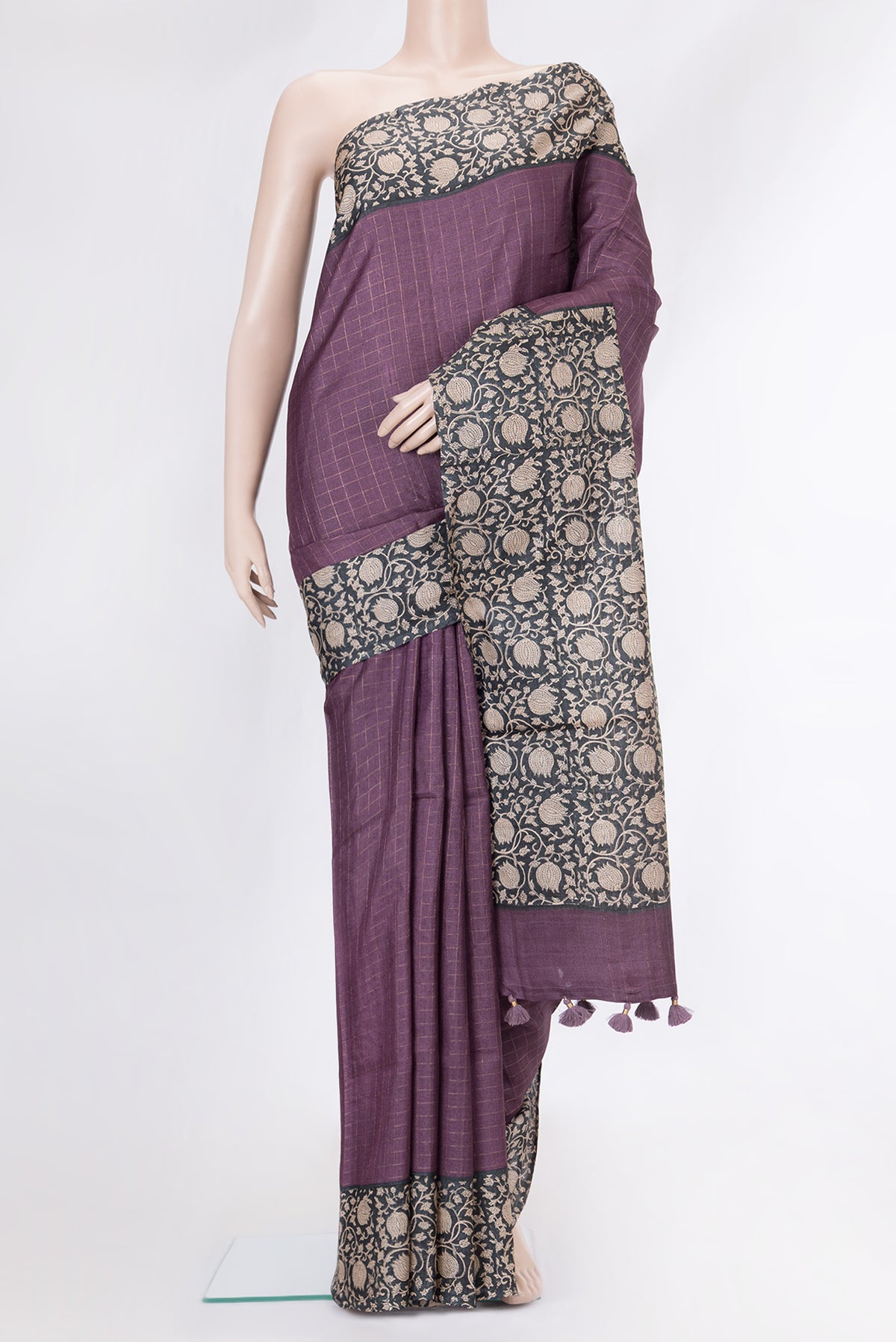 Purple Dual Tone Tussar Silk Saree with Checked design on the body and Printed Border.  displayed on a mannequin