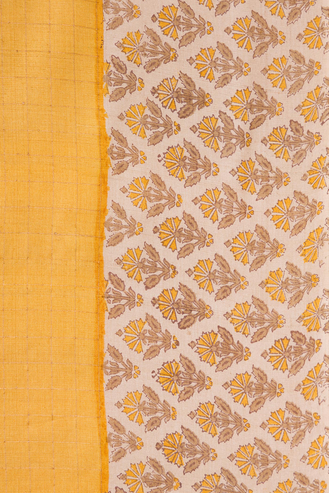 Border image of Mustard Dual Tone Tussar Silk Saree with Checked design on the body and Printed Border. 