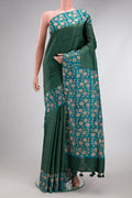 Green Dual Tone Tussar Silk Saree with Checked design on the body and Printed Border.  displayed on a mannequin