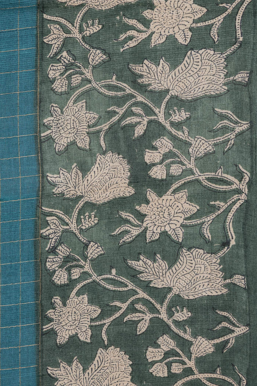 Border image of Peacock Blue Dual Tone Tussar Silk Saree with Checked design on the body and Printed Border. 