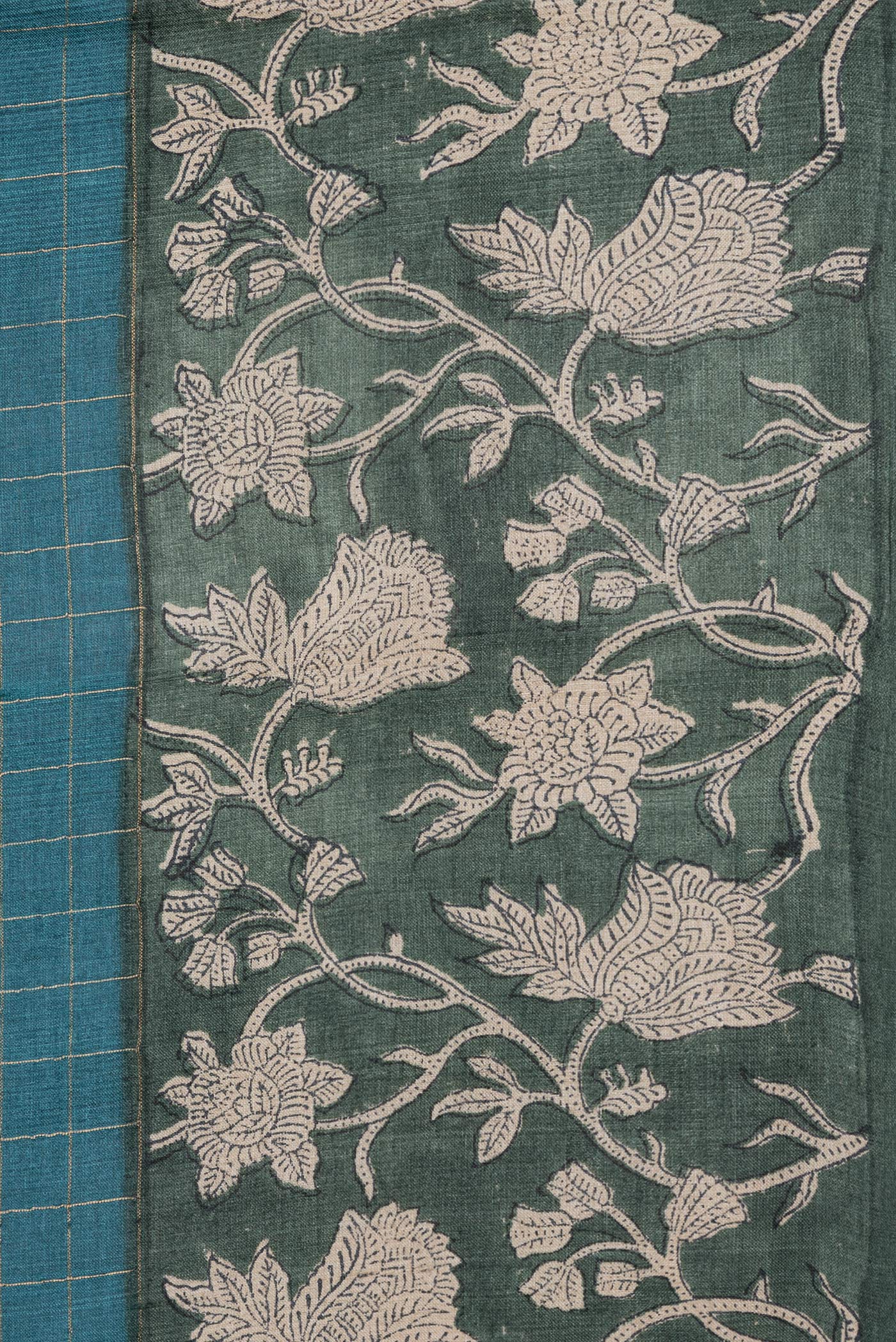 Border image of Peacock Blue Dual Tone Tussar Silk Saree with Checked design on the body and Printed Border. 