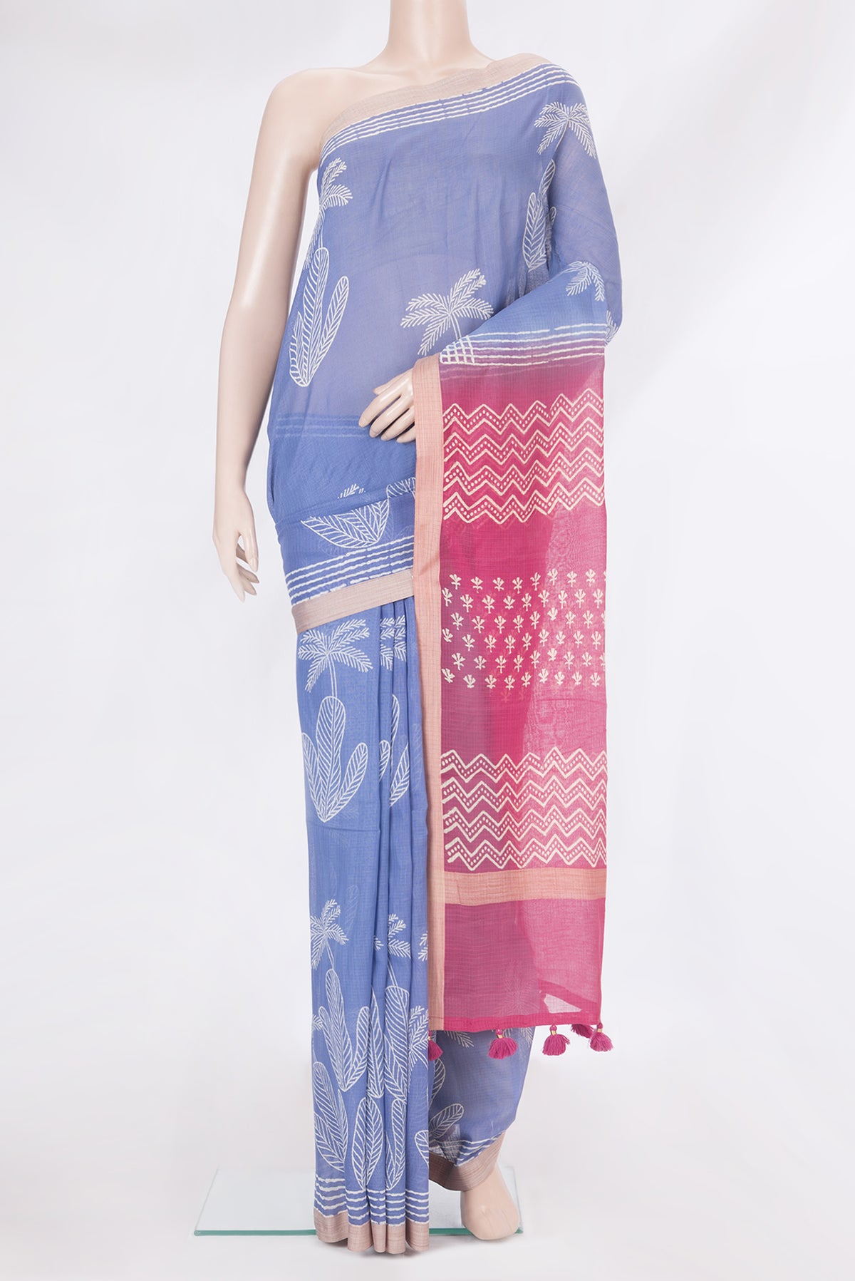 Maya Blue Kota Silk Saree with Printed design on the body and Plain Border.  displayed on a mannequin