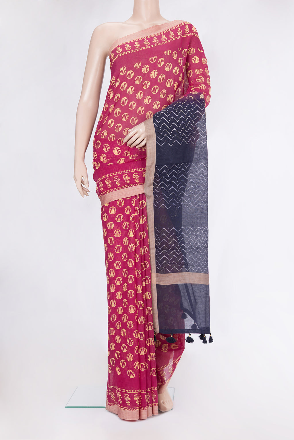 Dark Pink Kota Cotton Saree with Printed design on the body and Printed Border.  displayed on a mannequin