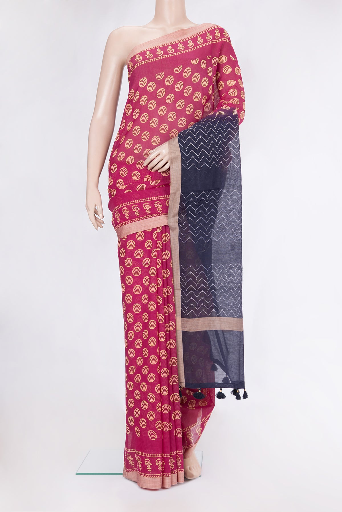 Dark Pink Kota Cotton Saree with Printed design on the body and Printed Border.  displayed on a mannequin