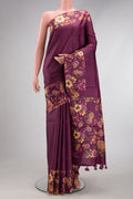 Magenta Dual Tone Tussar Silk Saree with Stripes on the body and Printed Border.  displayed on a mannequin