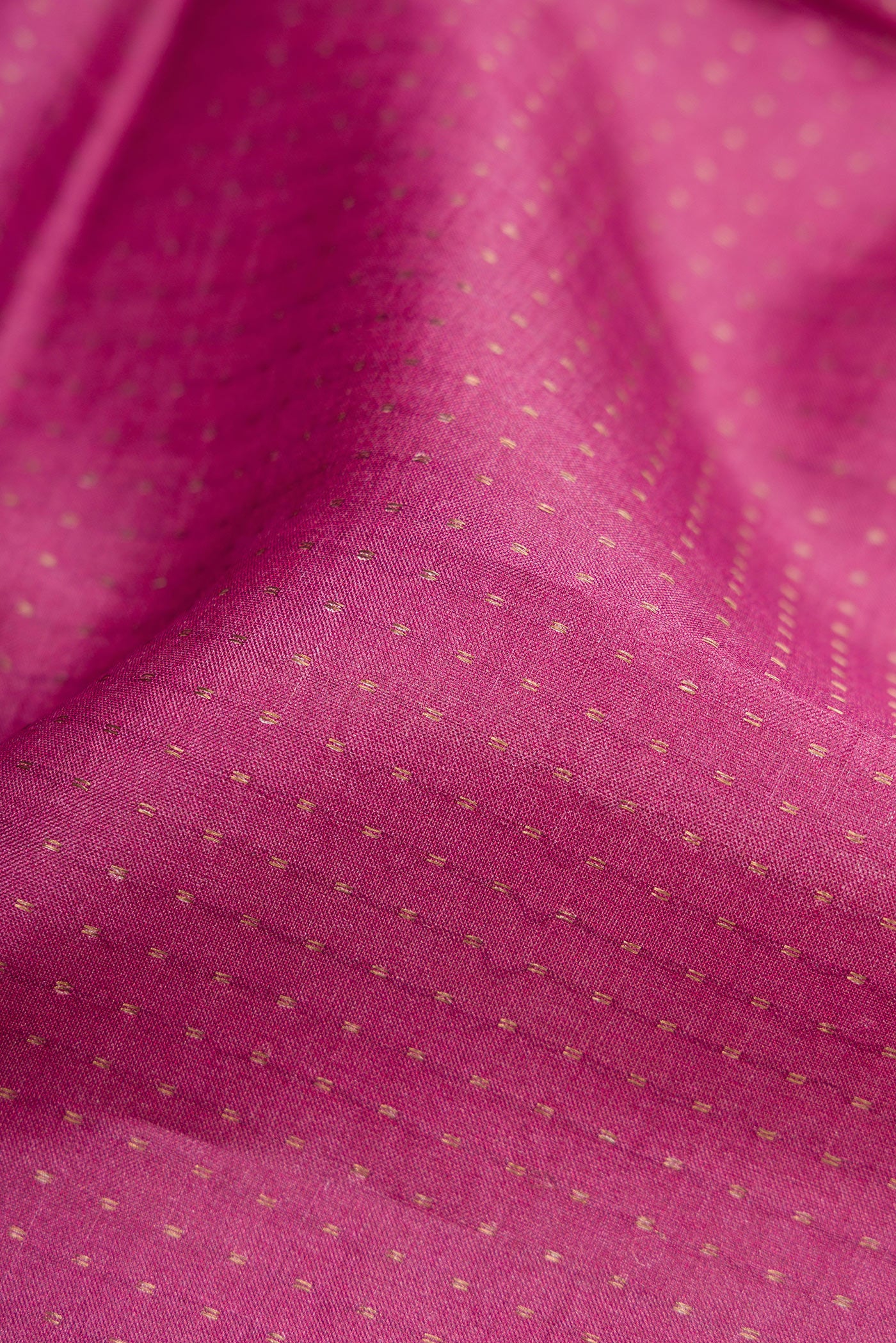 Close up of Pink Dual Tone Tussar Silk Saree with Stripes on the body and Printed Border.  displaying folds