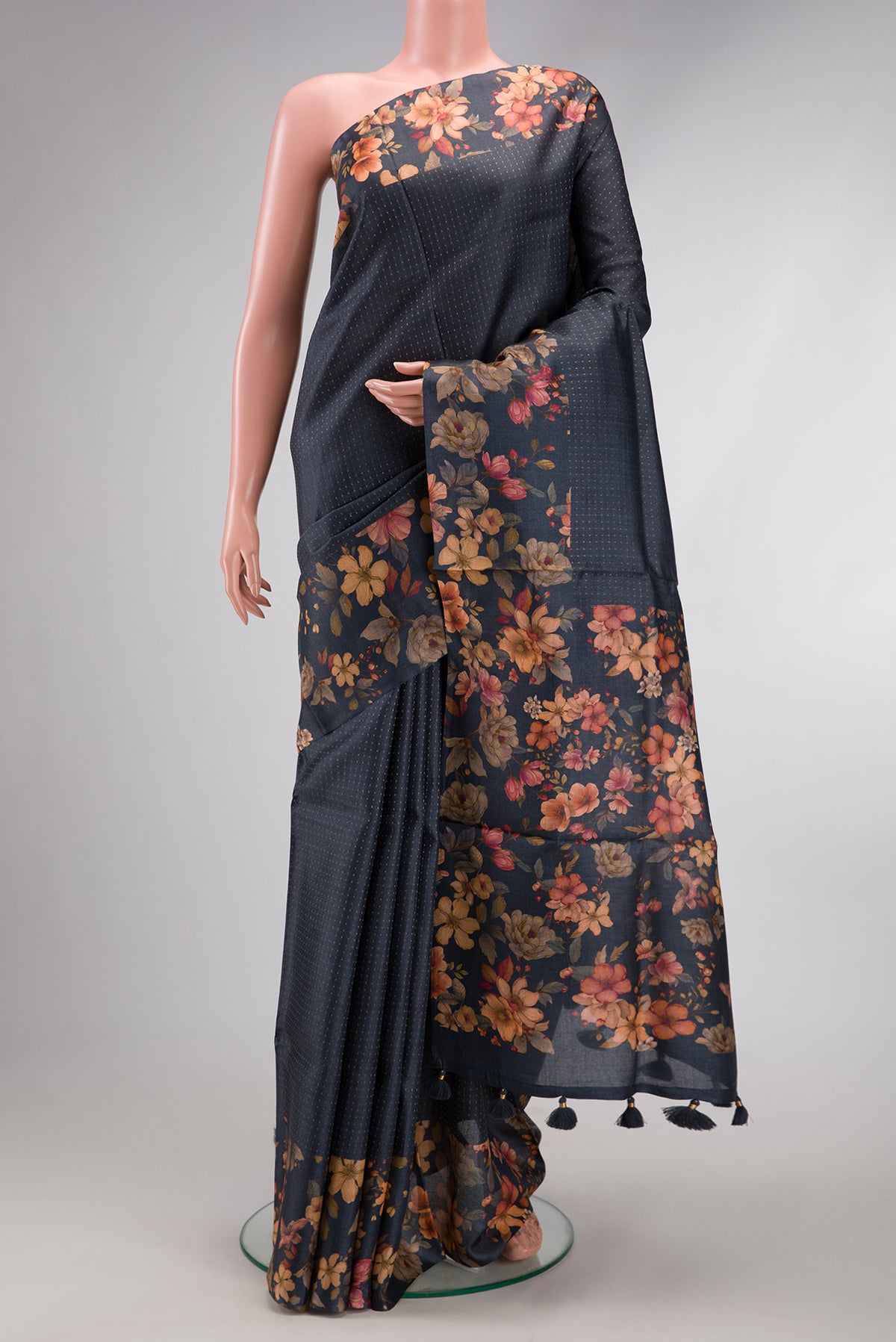 Grey Dual Tone Tussar Silk Saree with Stripes on the body and Printed Border.  displayed on a mannequin