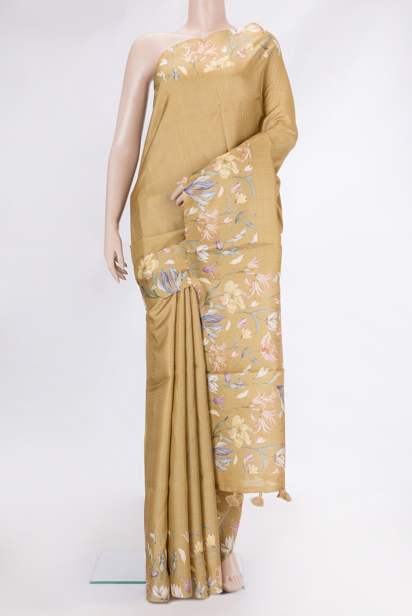 Gold Dual Tone Tussar Silk Saree with Printed design on the body and Printed Border.  displayed on a mannequin