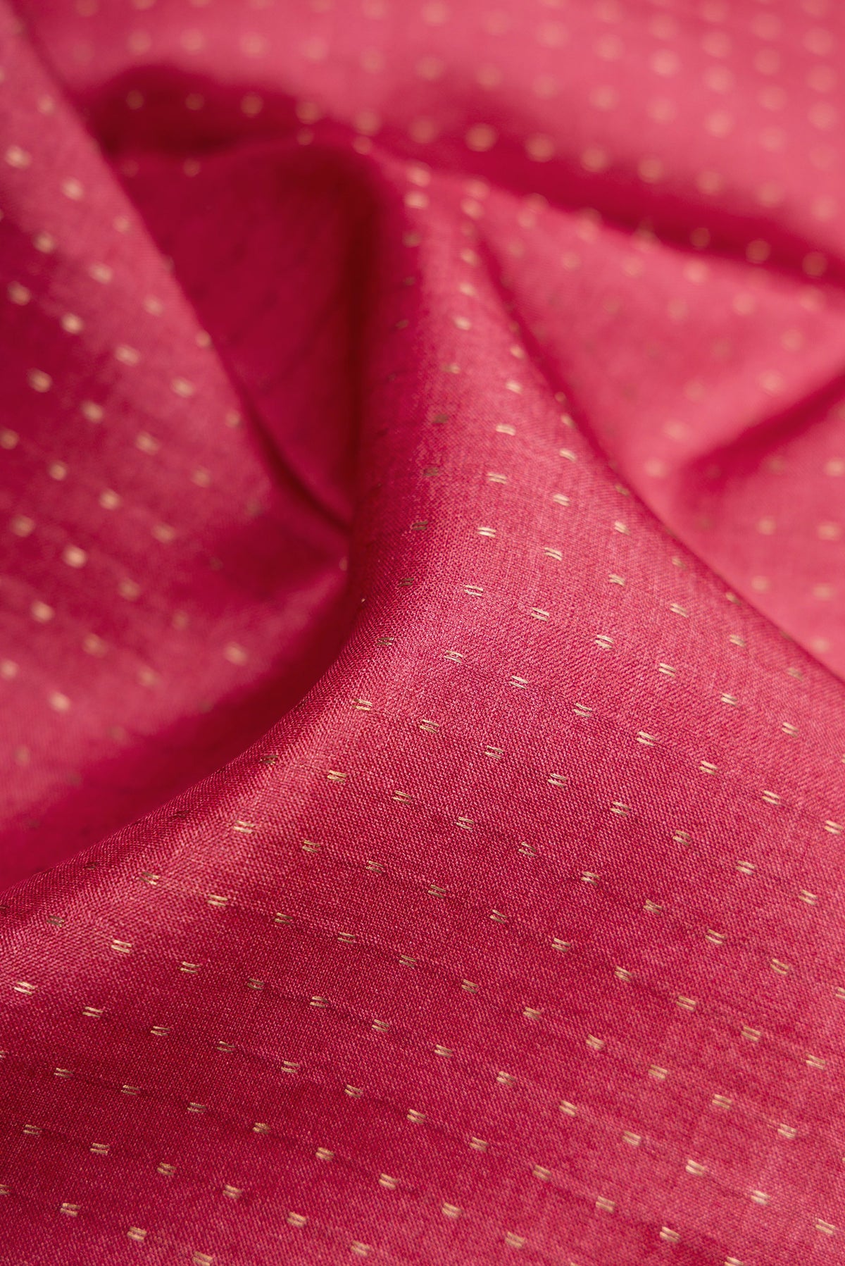 Close up of Maroon Dual Tone Tussar Silk Saree with Stripes on the body and Printed Border.  displaying folds
