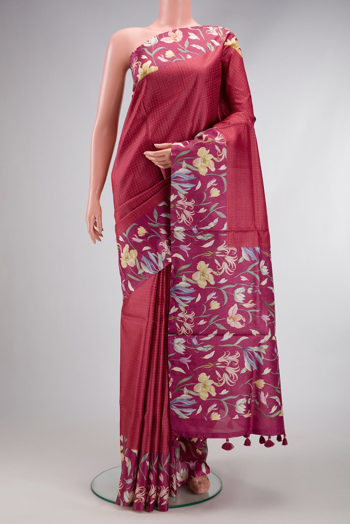 Maroon Dual Tone Tussar Silk Saree with Stripes on the body and Printed Border.  displayed on a mannequin