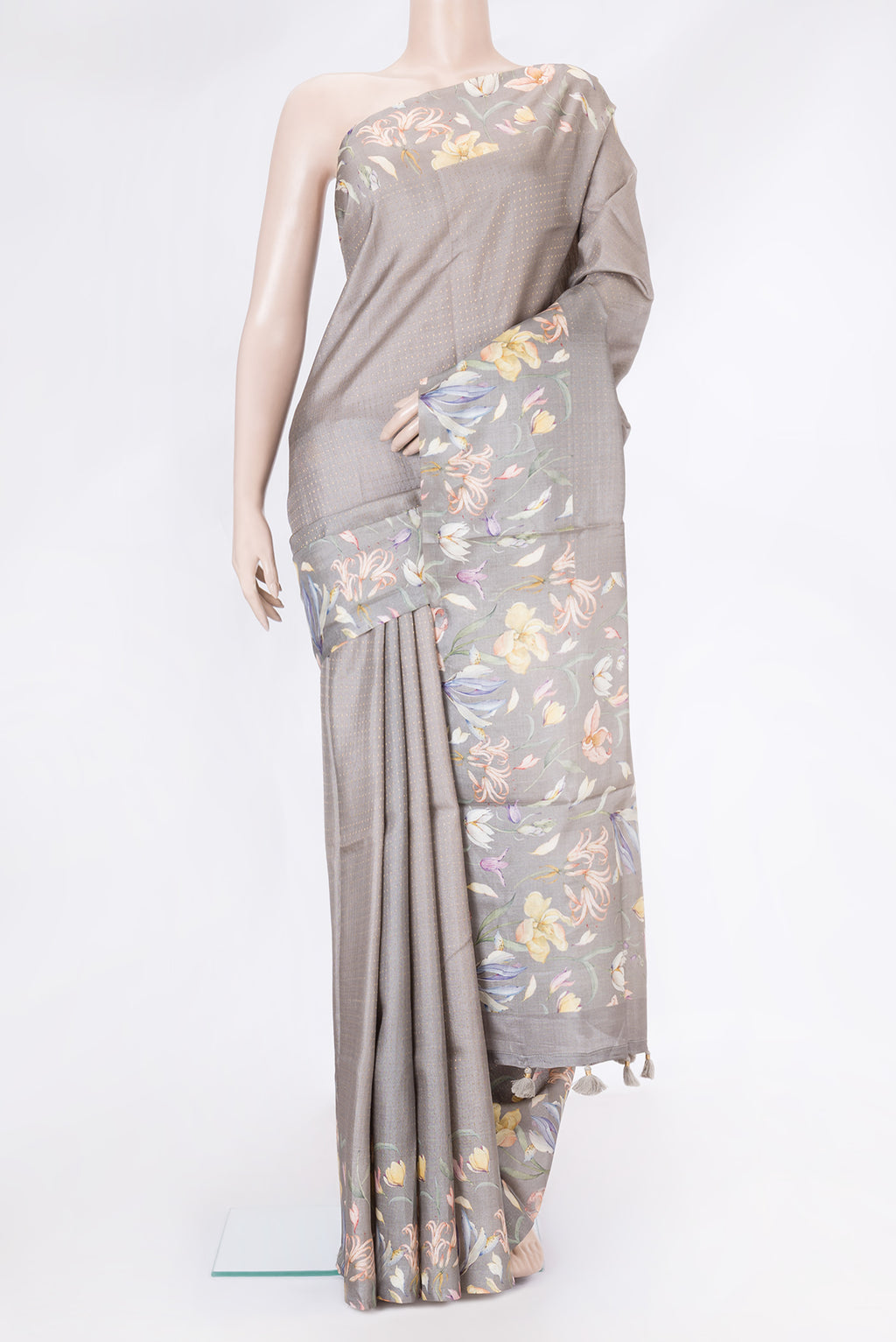 Grey Dual Tone Tussar Silk Saree with Stripes on the body and Printed Border.  displayed on a mannequin