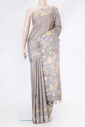 Grey Dual Tone Tussar Silk Saree with Stripes on the body and Printed Border.  displayed on a mannequin