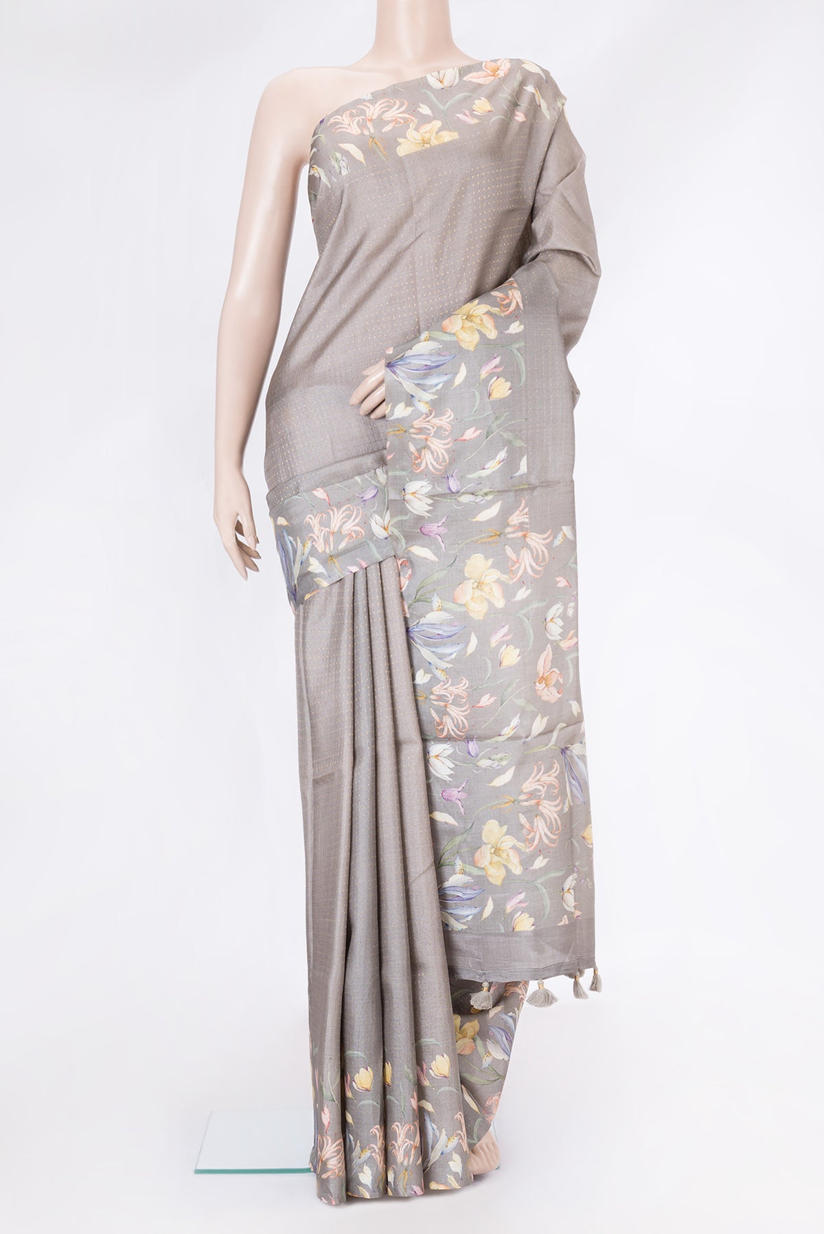 Grey Dual Tone Tussar Silk Saree with Stripes on the body and Printed Border.  displayed on a mannequin