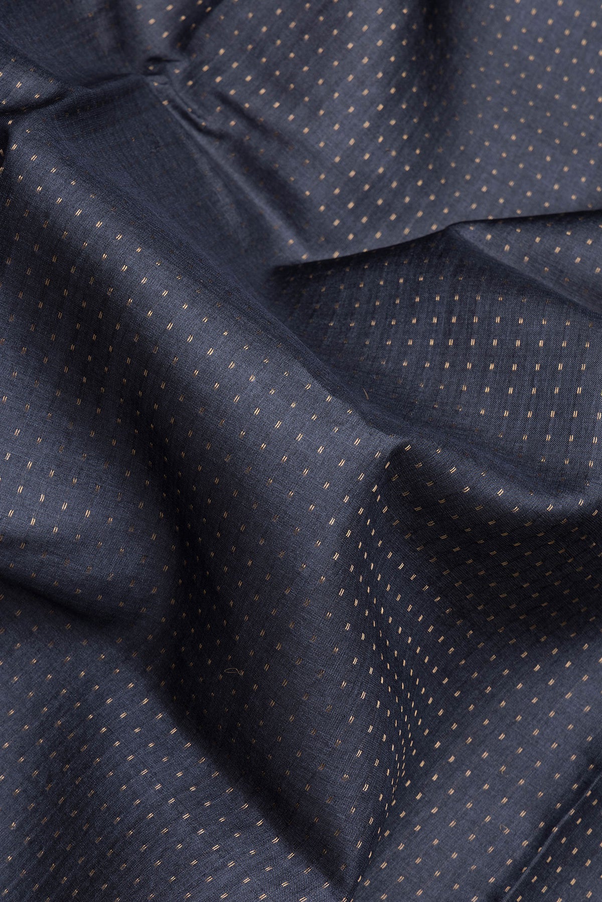 Close up of Black Tussar Silk Saree with Stripes on the body and Printed Border.  displaying folds