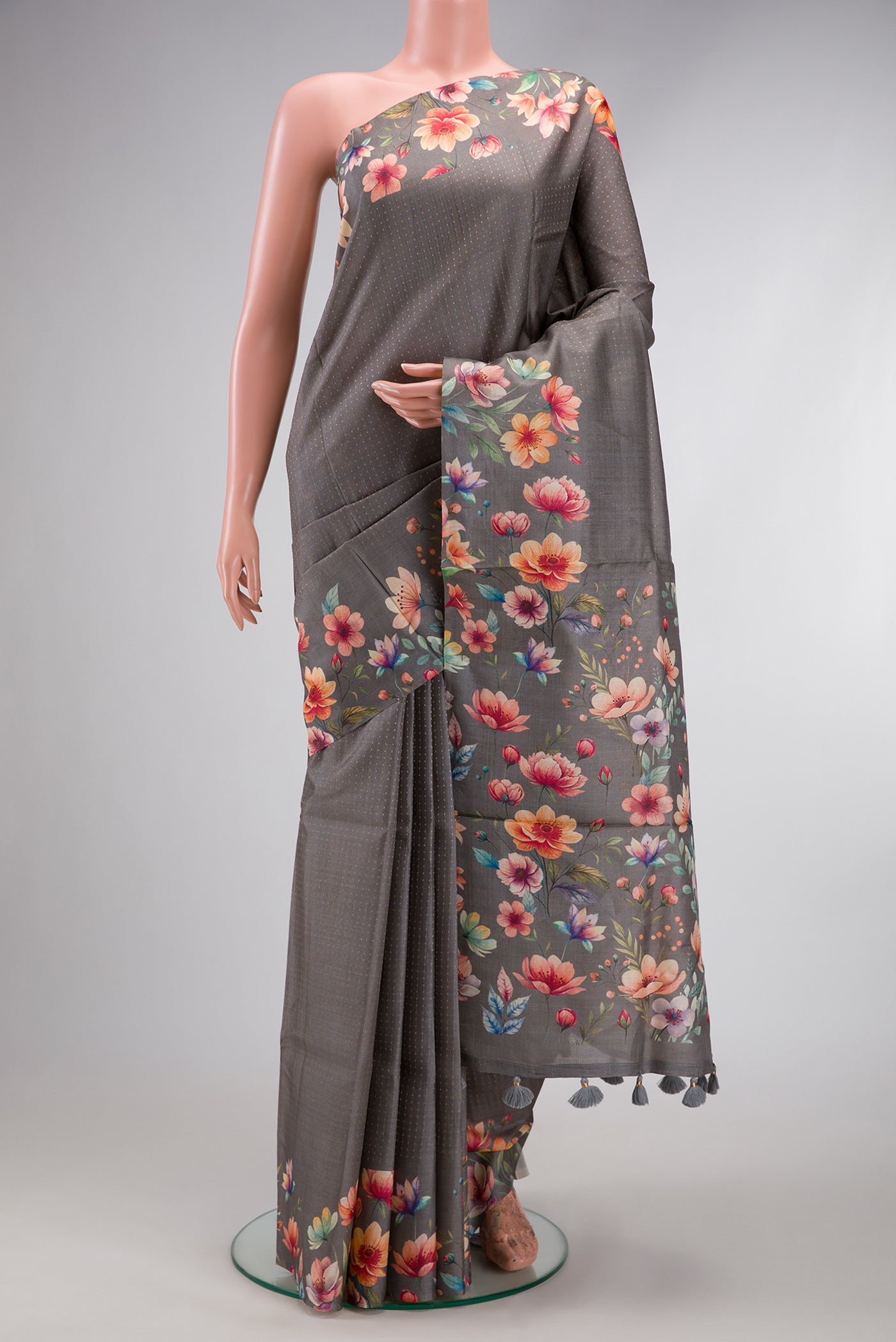 Grey Dual Tone Tussar Silk Saree with Stripes on the body and Printed Border.  displayed on a mannequin