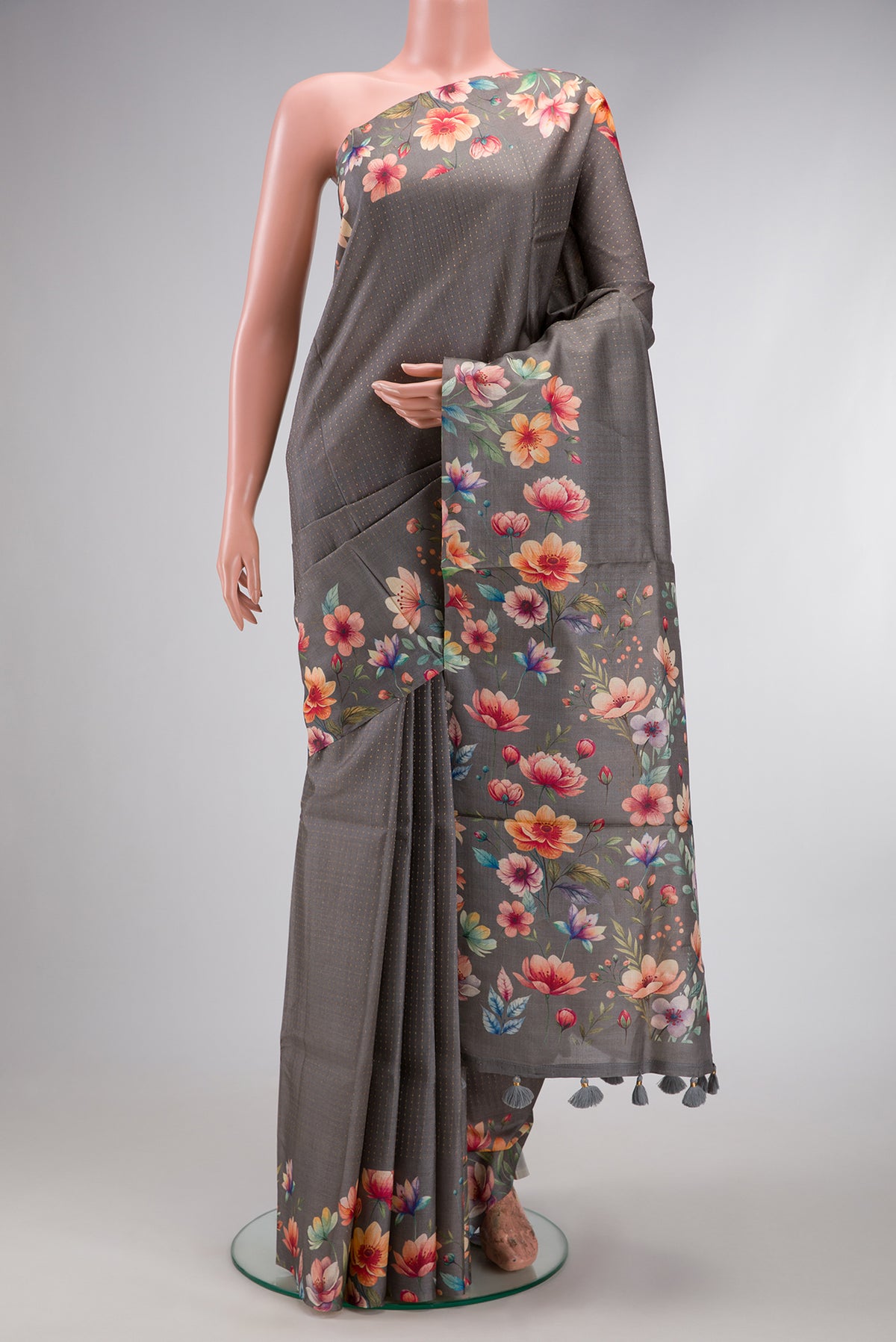 Grey Dual Tone Tussar Silk Saree with Stripes on the body and Printed Border.  displayed on a mannequin