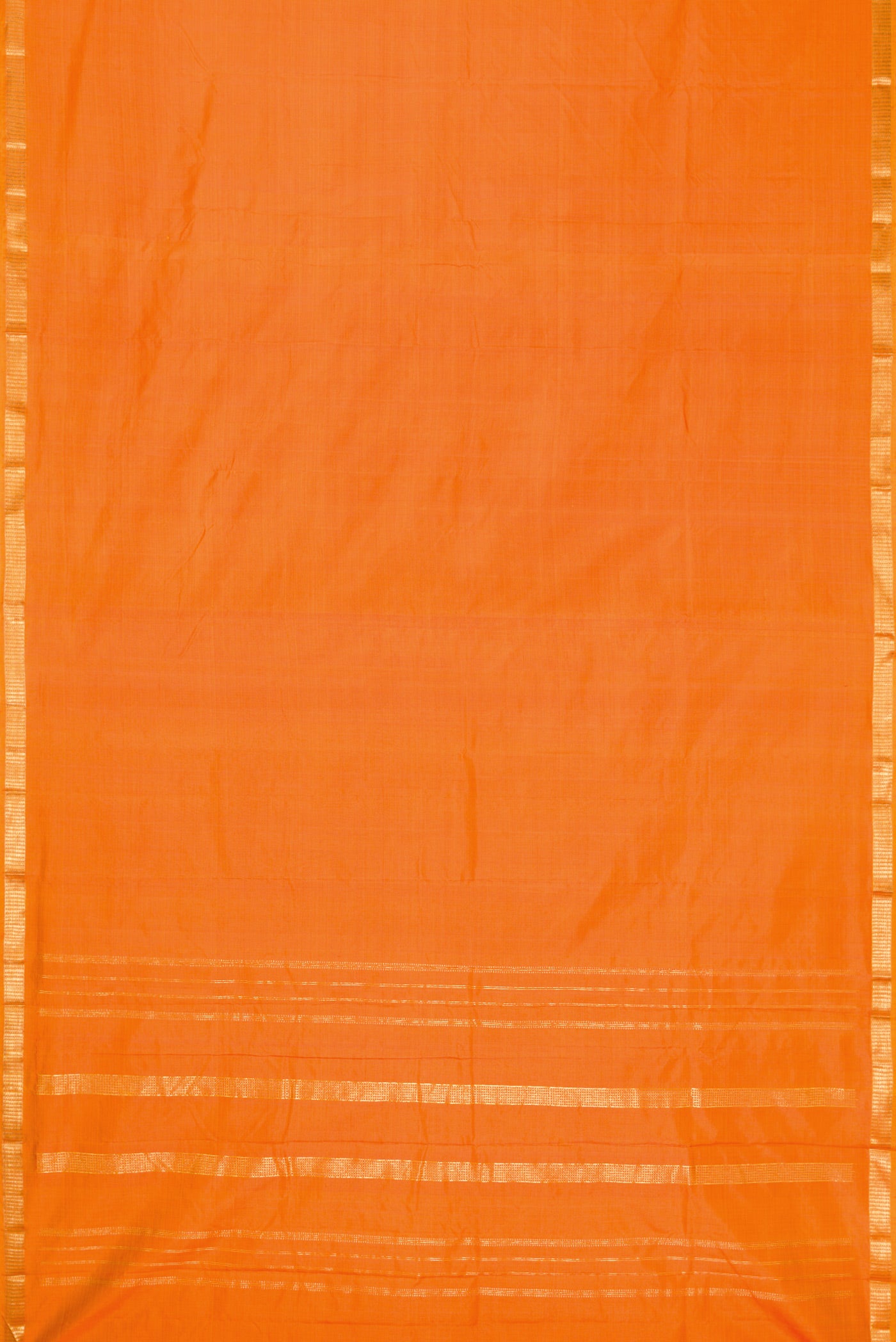 Orange Dual Tone Kanchipuram Silk Saree with Plain Body and Zari Border.  displayed on a mannequin