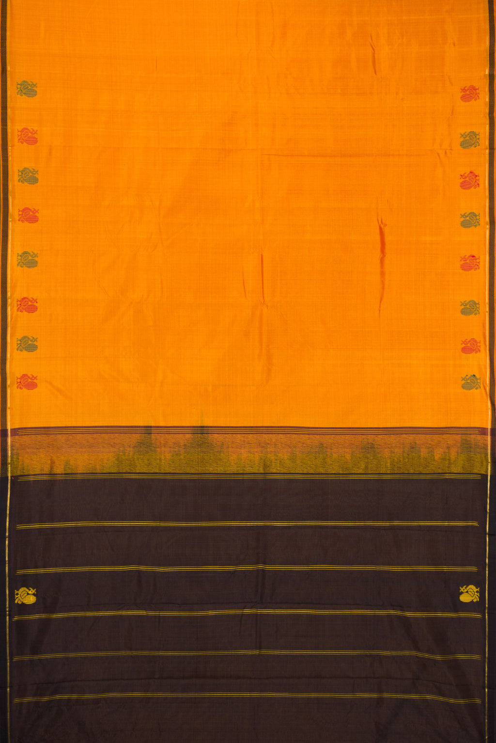 Flat view of Mustard Kanchipuram Silk Saree with Plain Body and Thread Border. 