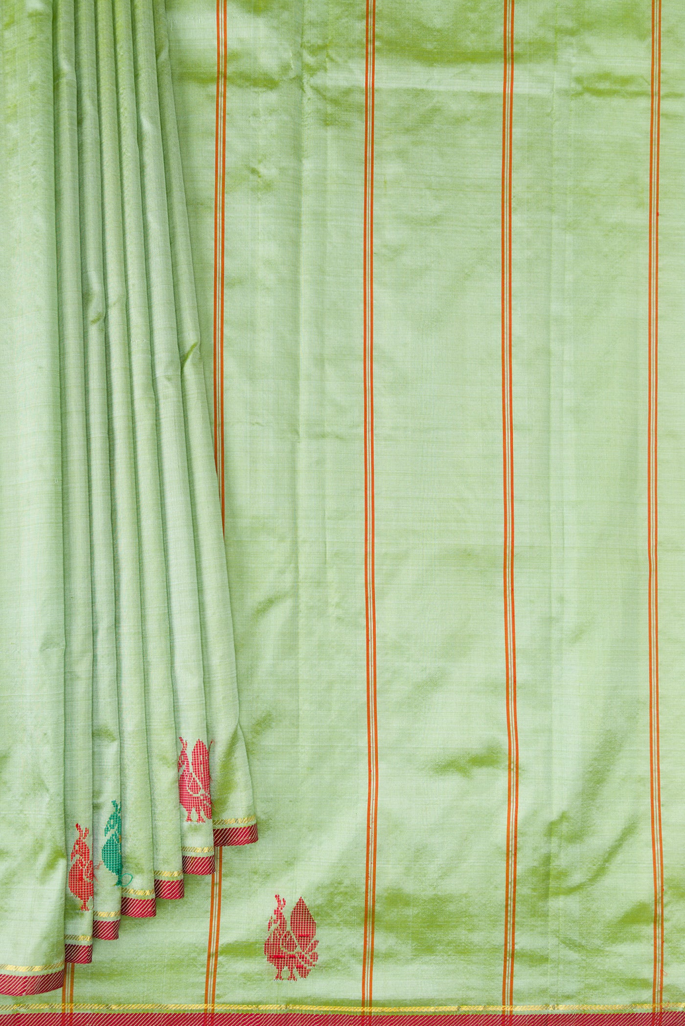 Pleats and pallu of Light Green Kanchipuram Silk Saree with Plain Body and Thread Border. 