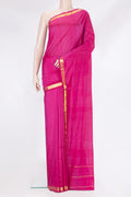 Magenta Kanchipuram Silk Saree with Plain Body and Zari Border.  displayed on a mannequin