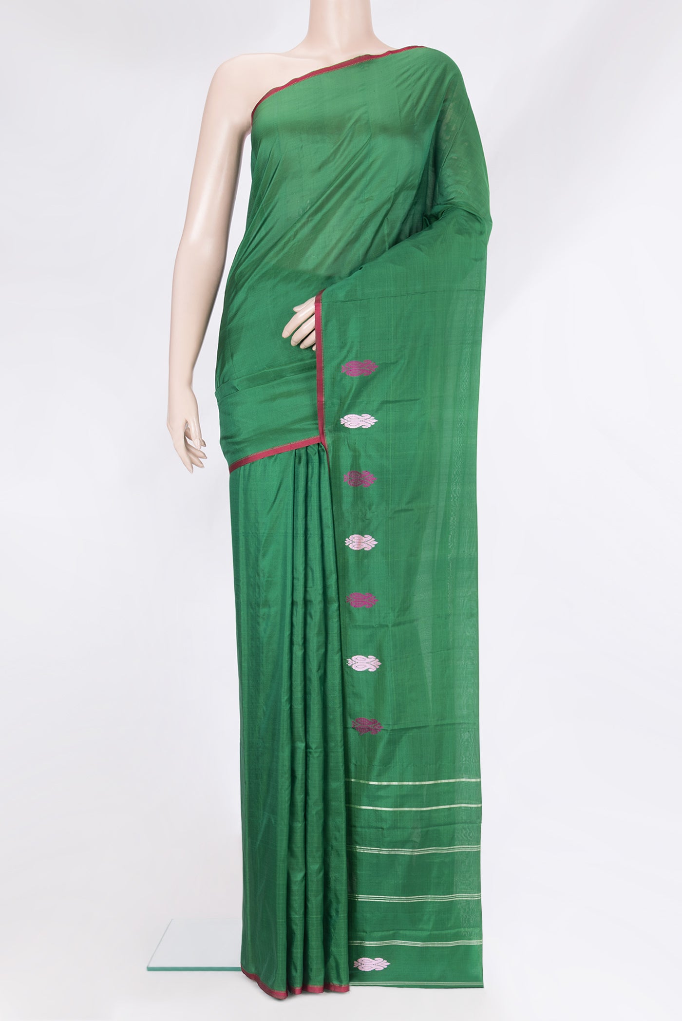 Bottle Green Kanchipuram Silk Saree with Plain Body and Thread Border.  displayed on a mannequin