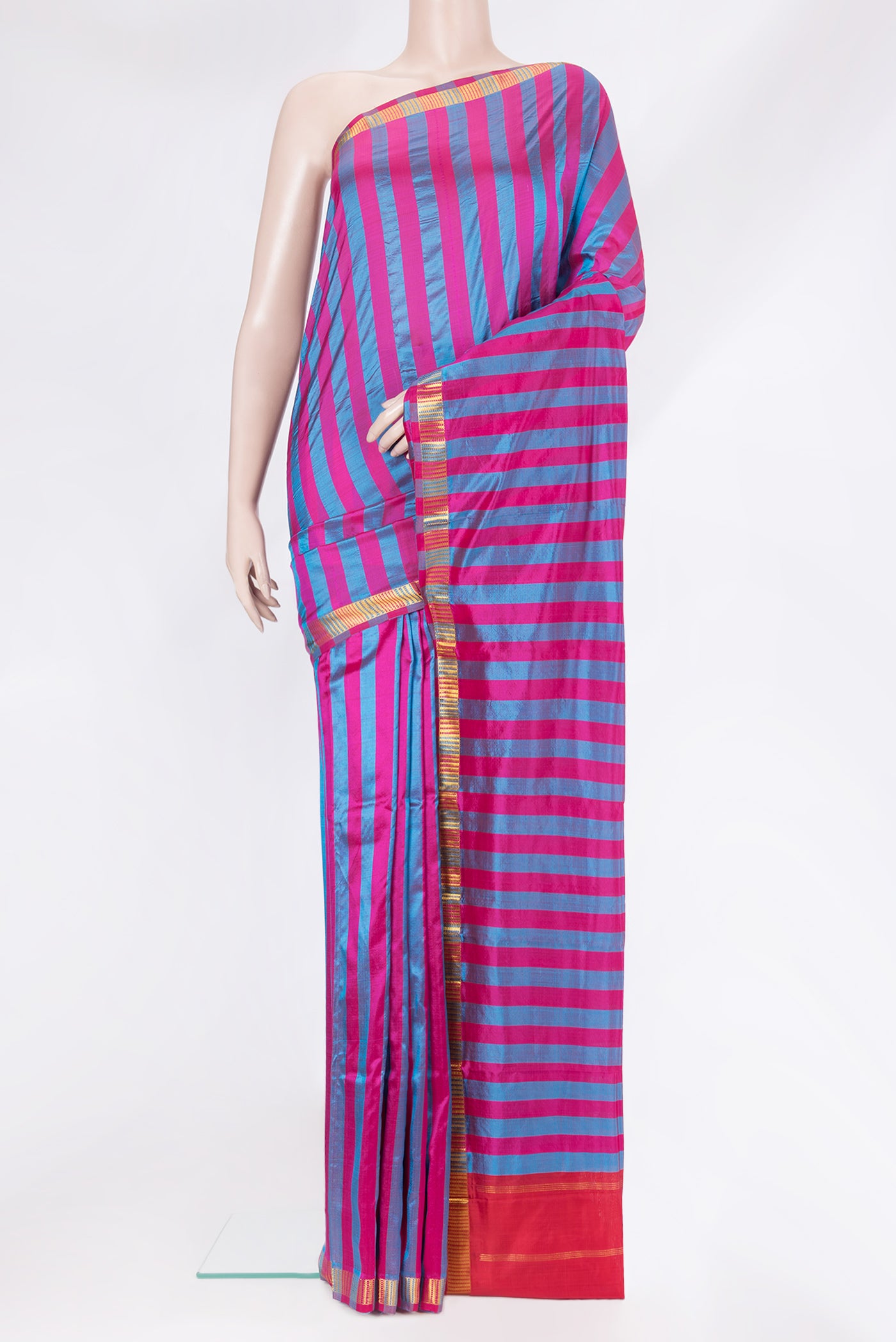 Multi Color Kanchipuram Silk Saree with Stripes on the body and Zari Border.  displayed on a mannequin