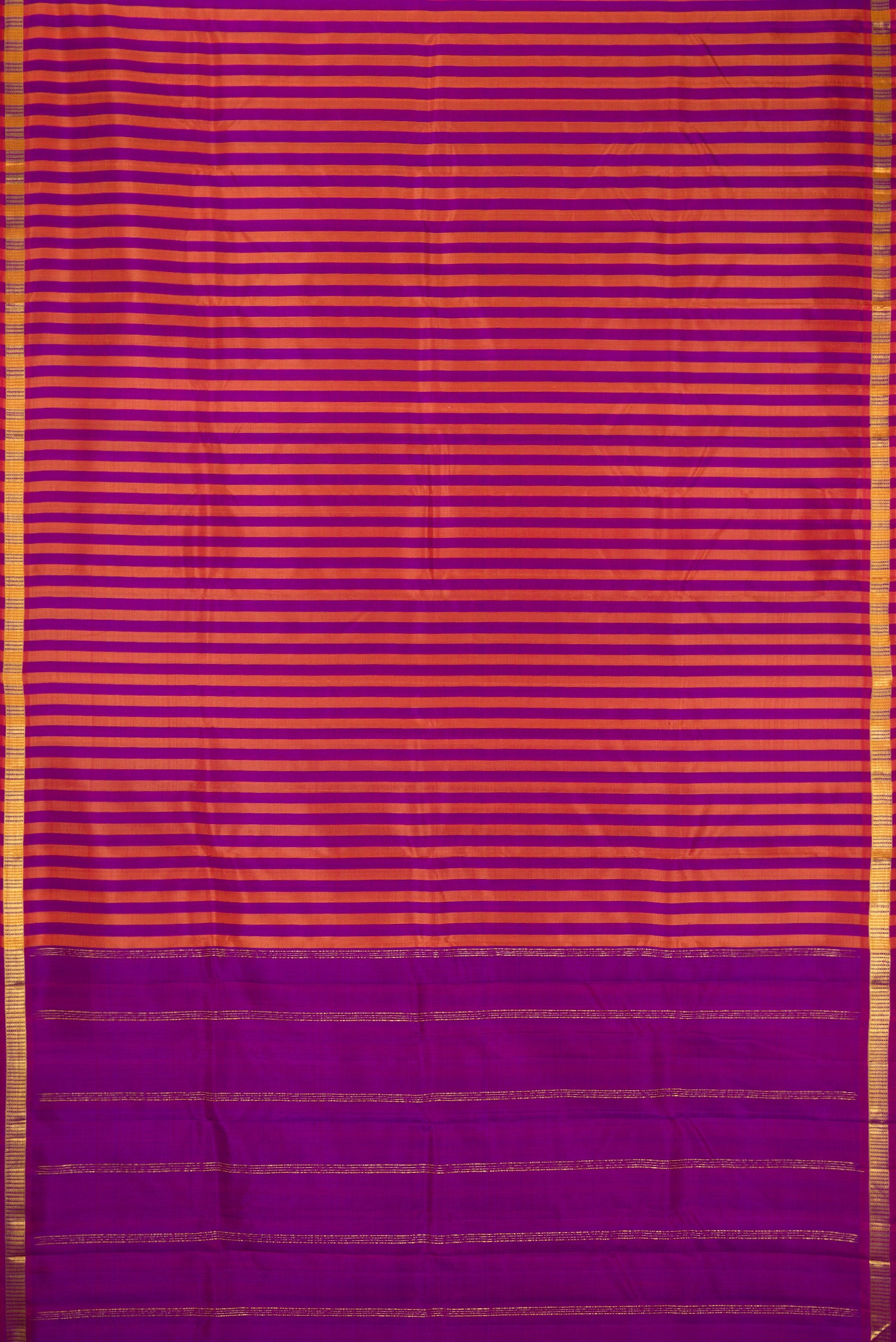 Purple and Brick Orange Color Kanchipuram Silk Saree with Stripes on the body and Zari Border.  displayed on a mannequin