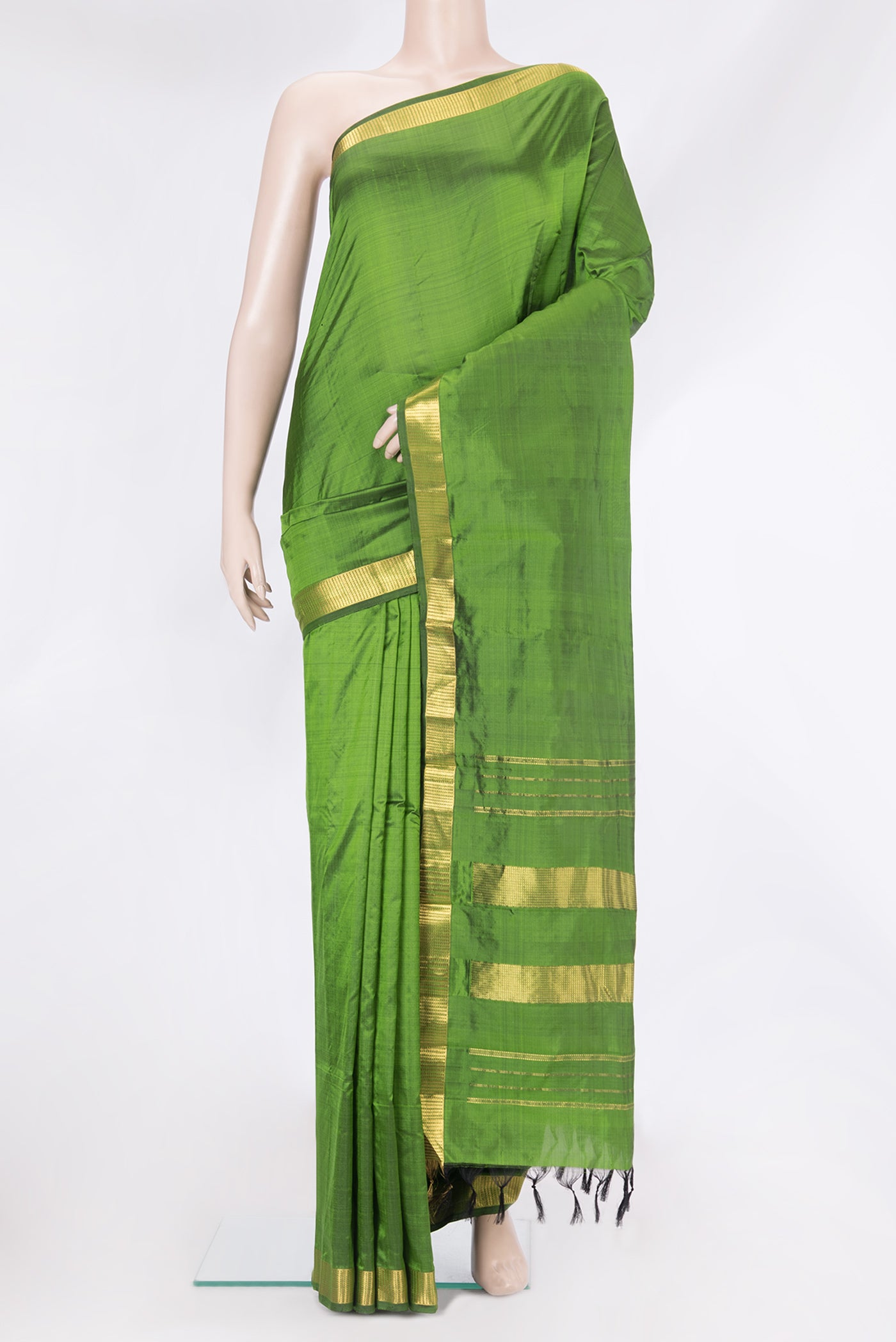 Mehandi Green Kanjivaram Silk Saree with Plain Body and Zari Border.  displayed on a mannequin