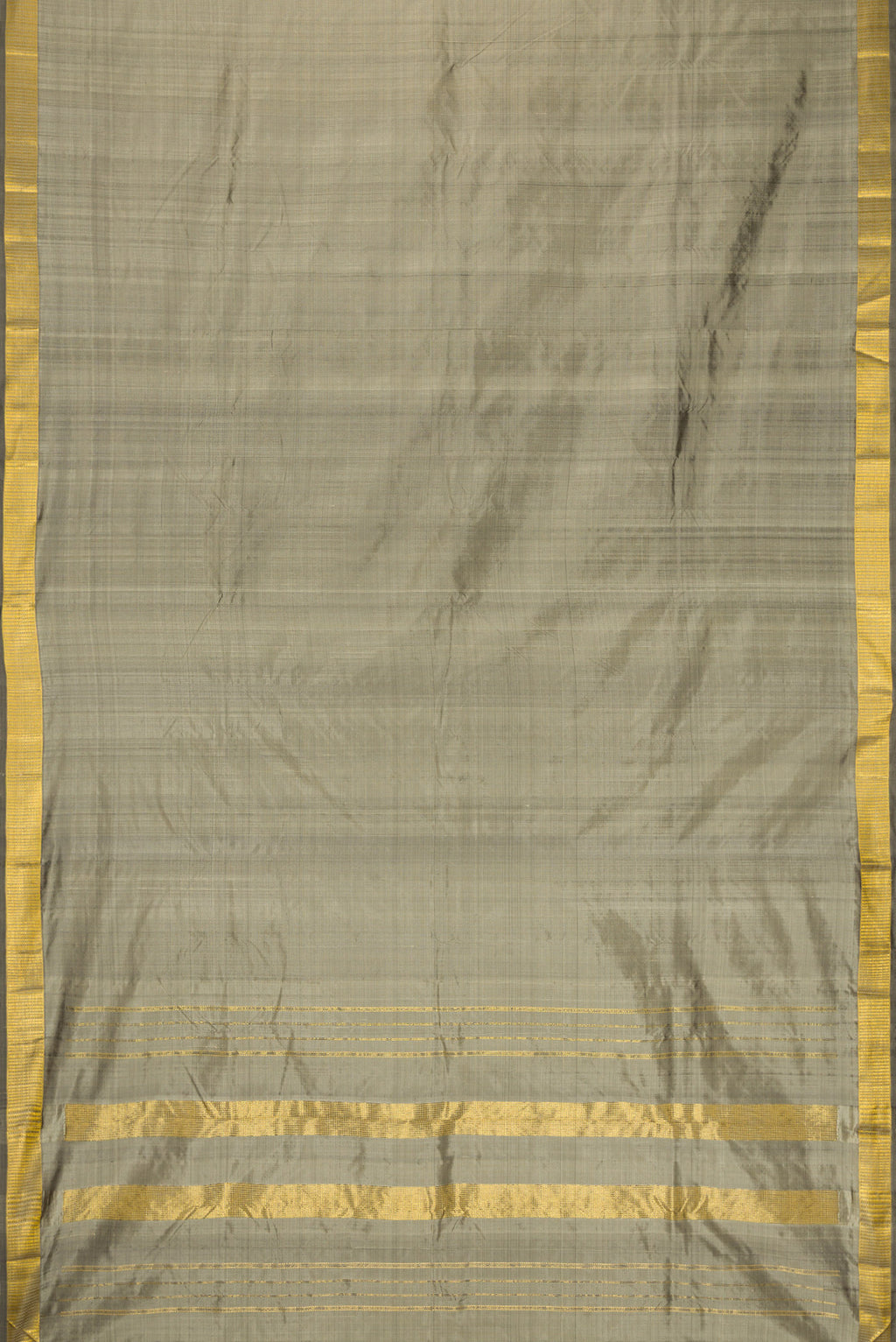 Grey Dual Tone Kanjivaram Silk Saree with Plain Body and Zari Border.  displayed on a mannequin