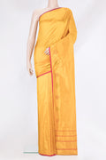 Mustard Kanchipuram Silk Saree with Plain Body and Fancy Border.  displayed on a mannequin