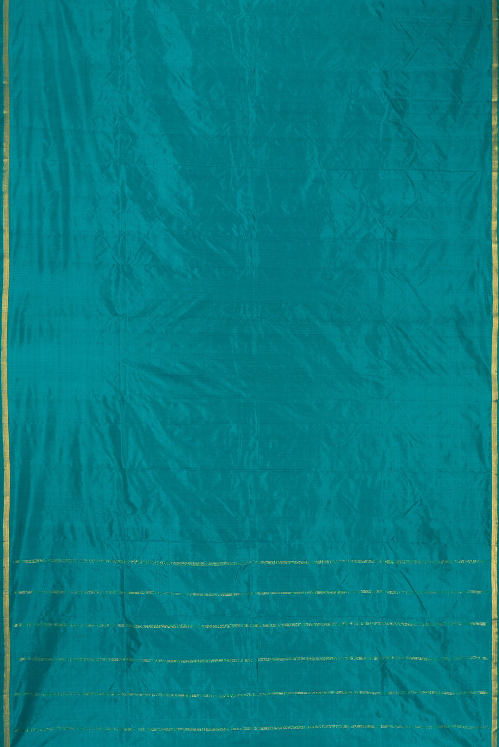 Green Dual Tone Kanchipuram Silk Nine Yards Saree with Thread Butta on the body and Zari Border.  displayed on a mannequin
