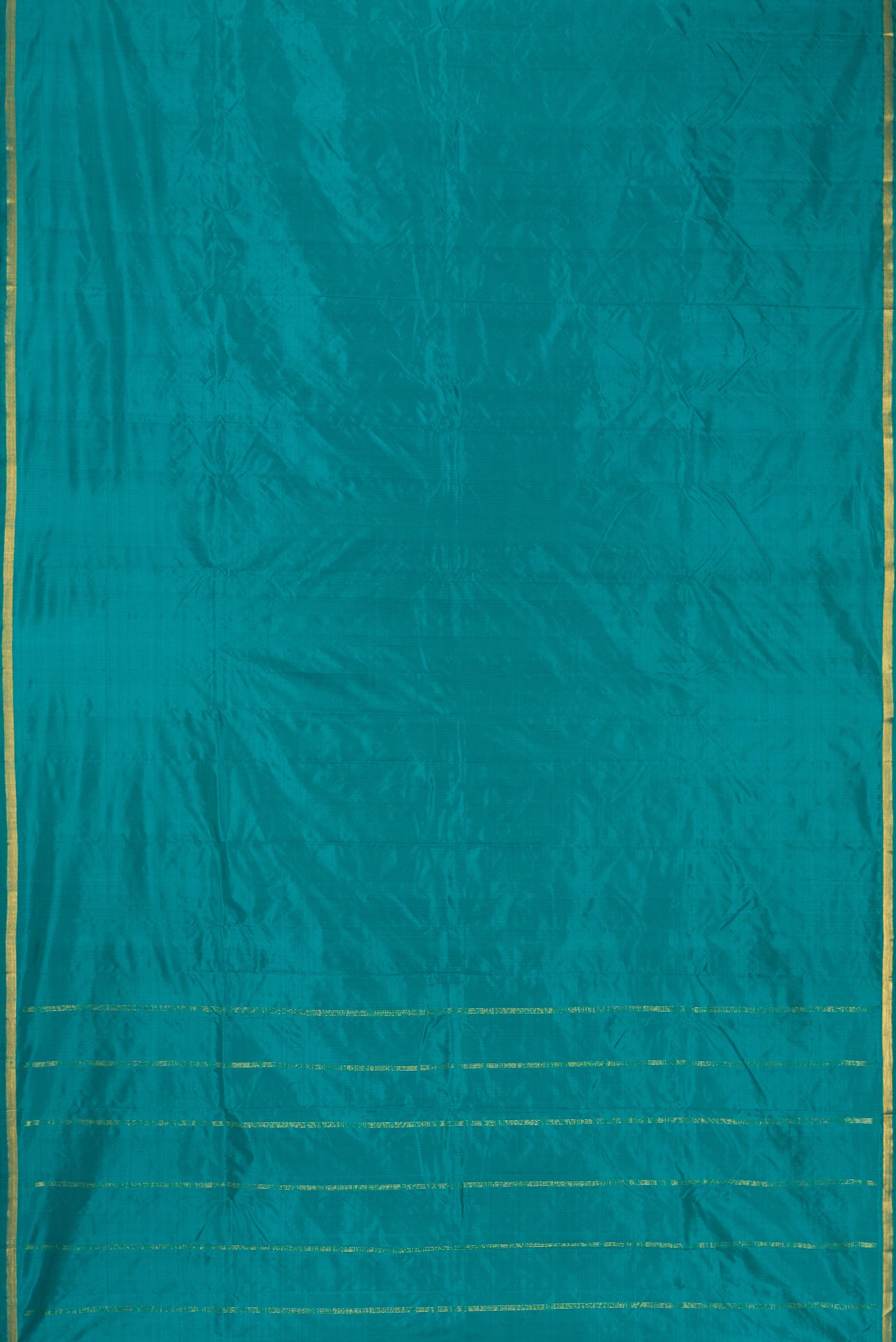 Green Dual Tone Kanchipuram Silk Nine Yards Saree with Thread Butta on the body and Zari Border.  displayed on a mannequin
