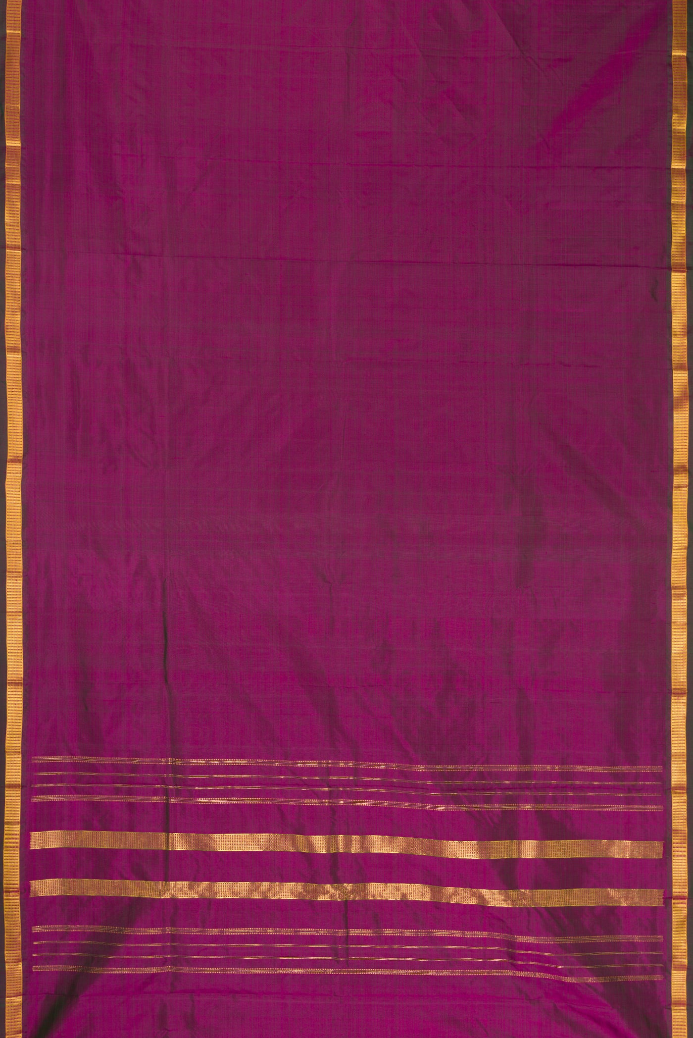 Purple Dual Tone Kanjivaram Silk Saree with Plain Body and Zari Border.  displayed on a mannequin