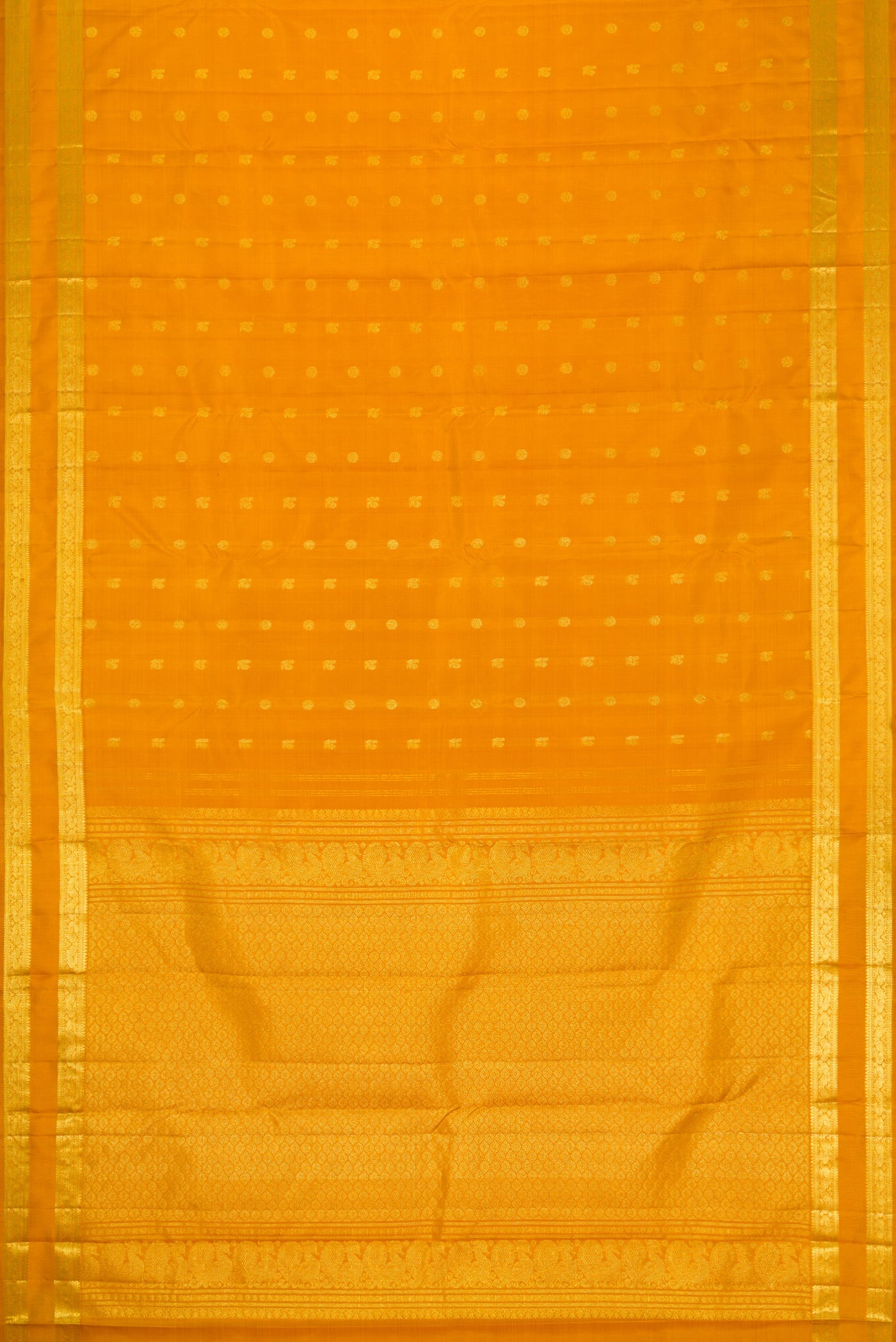 Flat view of Mustard Dual Tone Kanjivaram Silk Saree with Zari Butta on the body and Zari Border. 