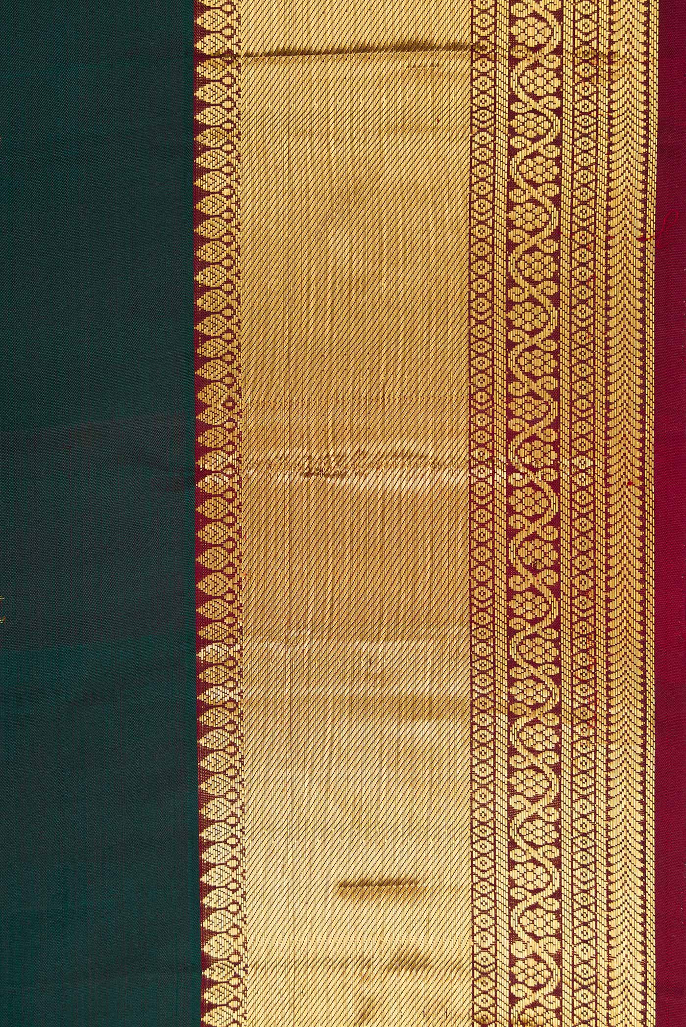 Border image of Bottle Green Dual Tone Kanjivaram Silk Saree with Zari Butta on the body and Zari Border. 