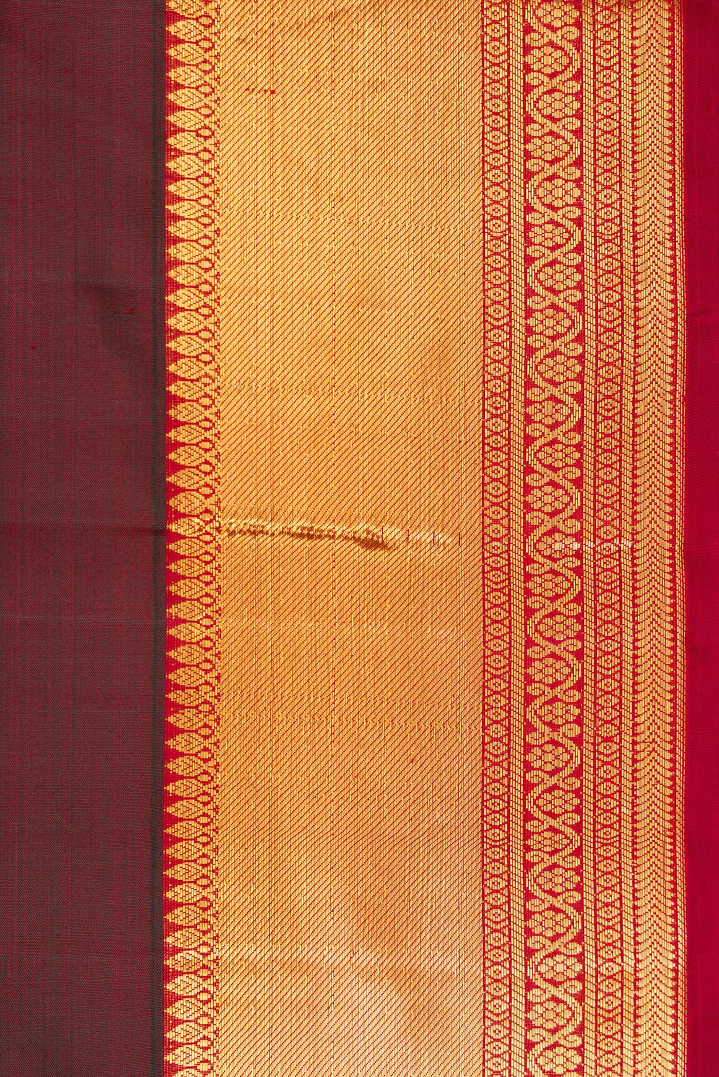 Border image of Maroon Dual Tone Kanjivaram Silk Saree with Zari Butta on the body and Zari Border. 