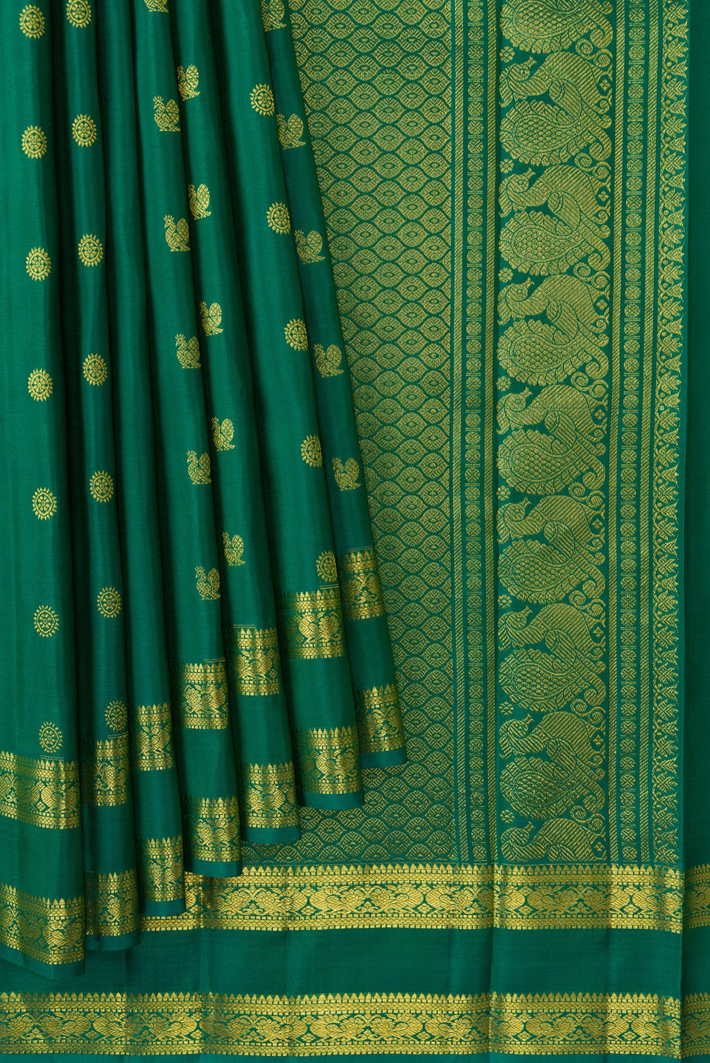 Pleats and pallu of Green Dual Tone Kanjivaram Silk Saree with Zari Butta on the body and Zari Border. 