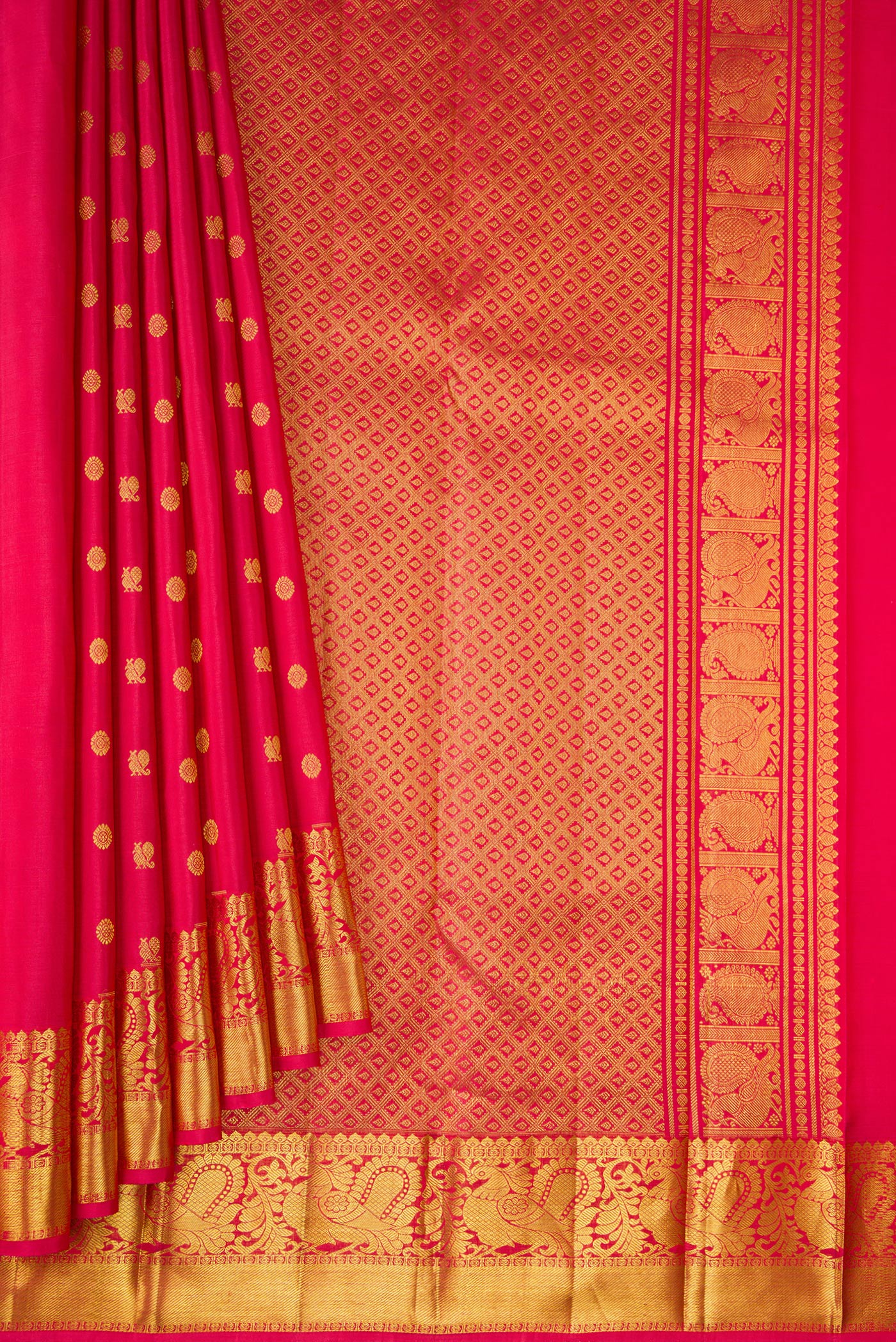 Pleats and pallu of Dark Pink Dual Tone Kanjivaram Silk Saree with Zari Butta on the body and Zari Border. 