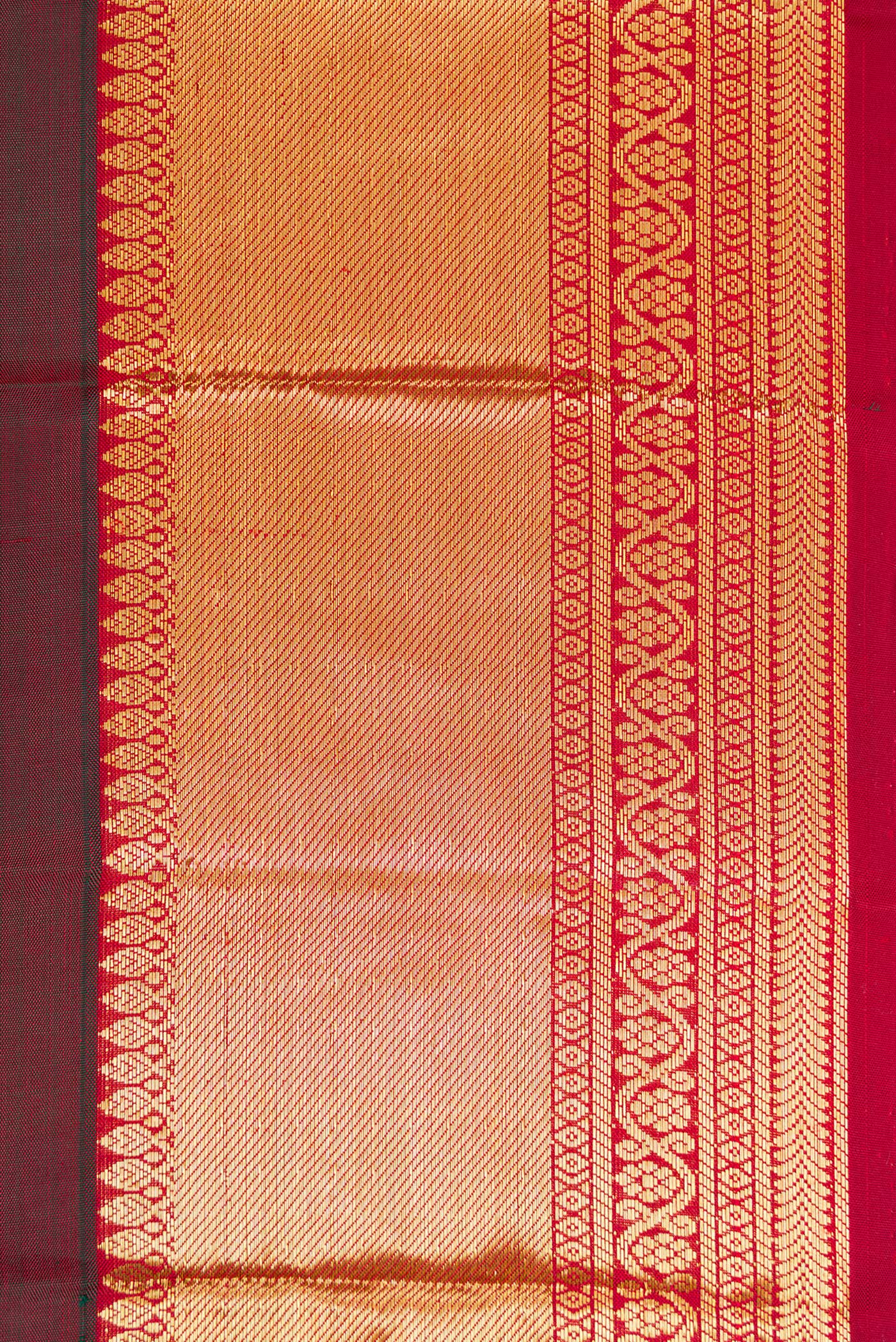 Border image of Maroon Dual Tone Kanjivaram Silk Saree with Zari Butta on the body and Zari Border. 