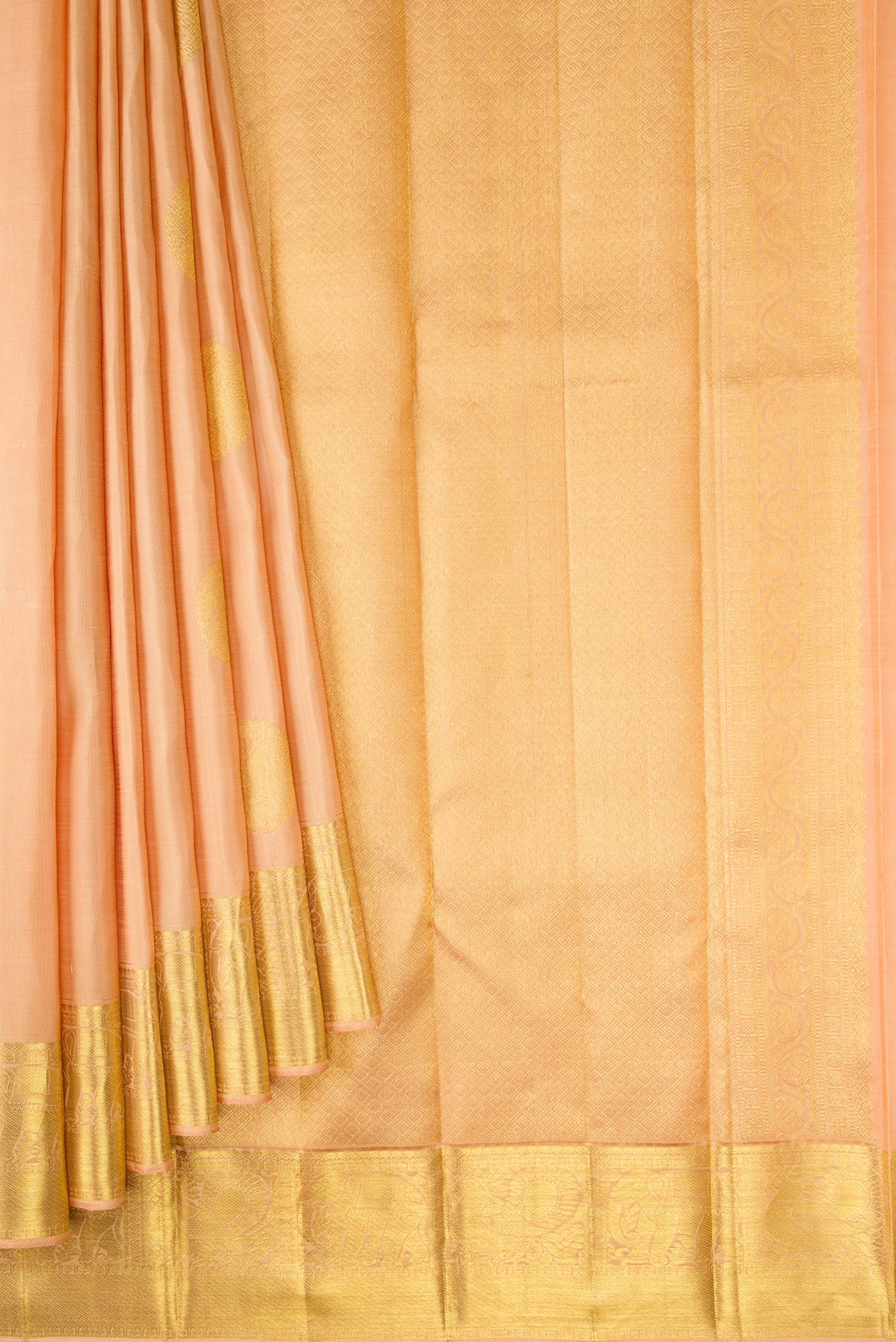 Pleats and pallu of Golden Peach Dual Tone Kanjivaram Silk Saree with Zari Butta on the body and Zari Border. 